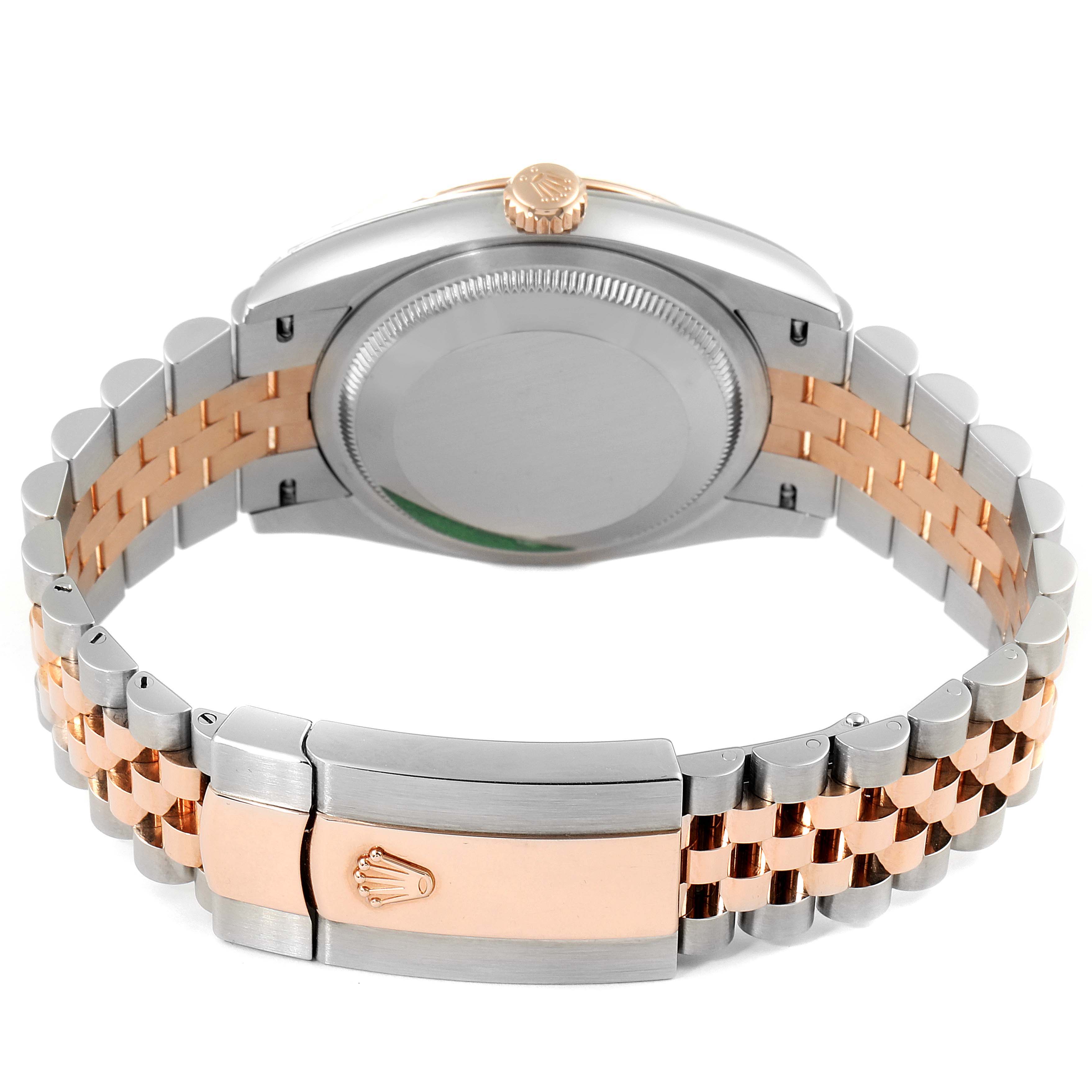 This image shows the back and band of a Rolex Datejust 126231 Men's Rose Gold Grey Dial 126231 Men's Rose Gold Grey Dial watch, highlighting its clasp and crown.