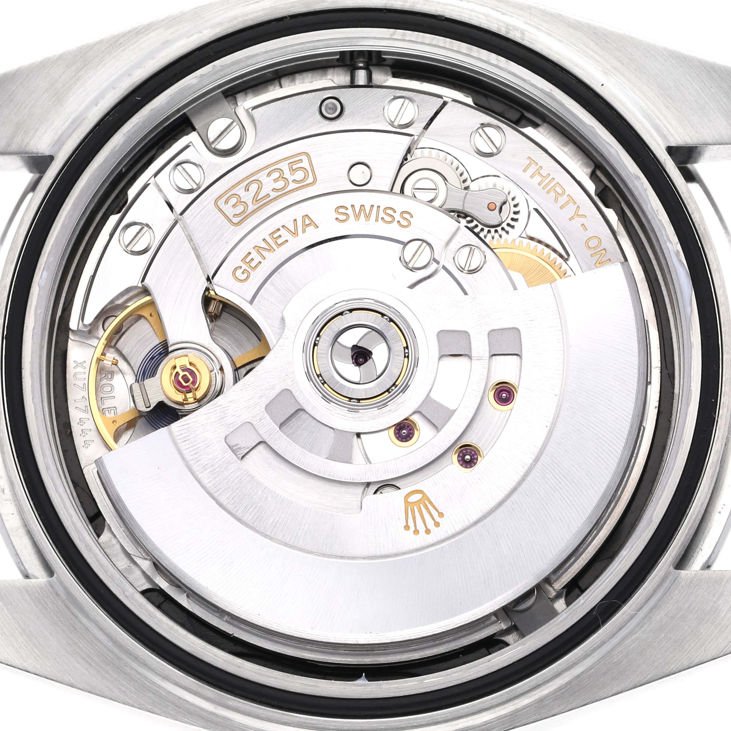 The image shows the movement and internal components of a Rolex Datejust 41 126300 Men's Stainless Steel Black Dial 126300 Men's Stainless Steel Black Dial watch from a rear angle.