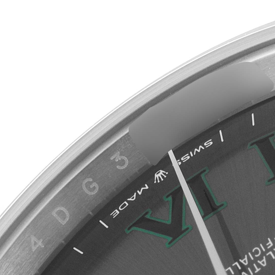 This image shows a close-up of an edge portion of the Rolex Datejust 41 126300 Men
s Stainless Steel Grey Dial 126300 Men
s Stainless Steel Grey Dial dial and bezel near the IV hour marker.