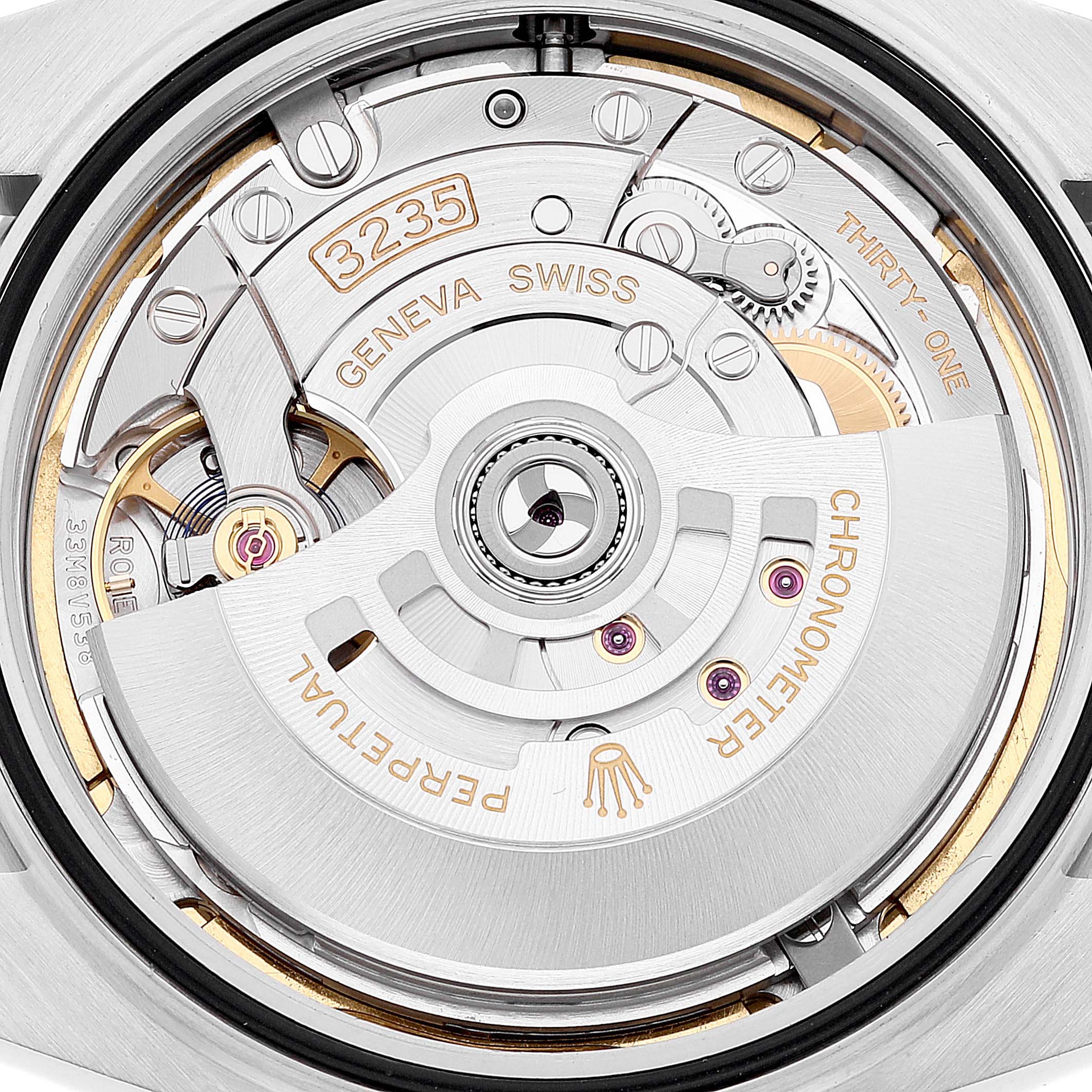 This image shows a close-up view of the Rolex Datejust 41 126300 Men
s Stainless Steel Green Dial 126300 Men
s Stainless Steel Green Dial model
s movement, specifically the Calibre 3235.