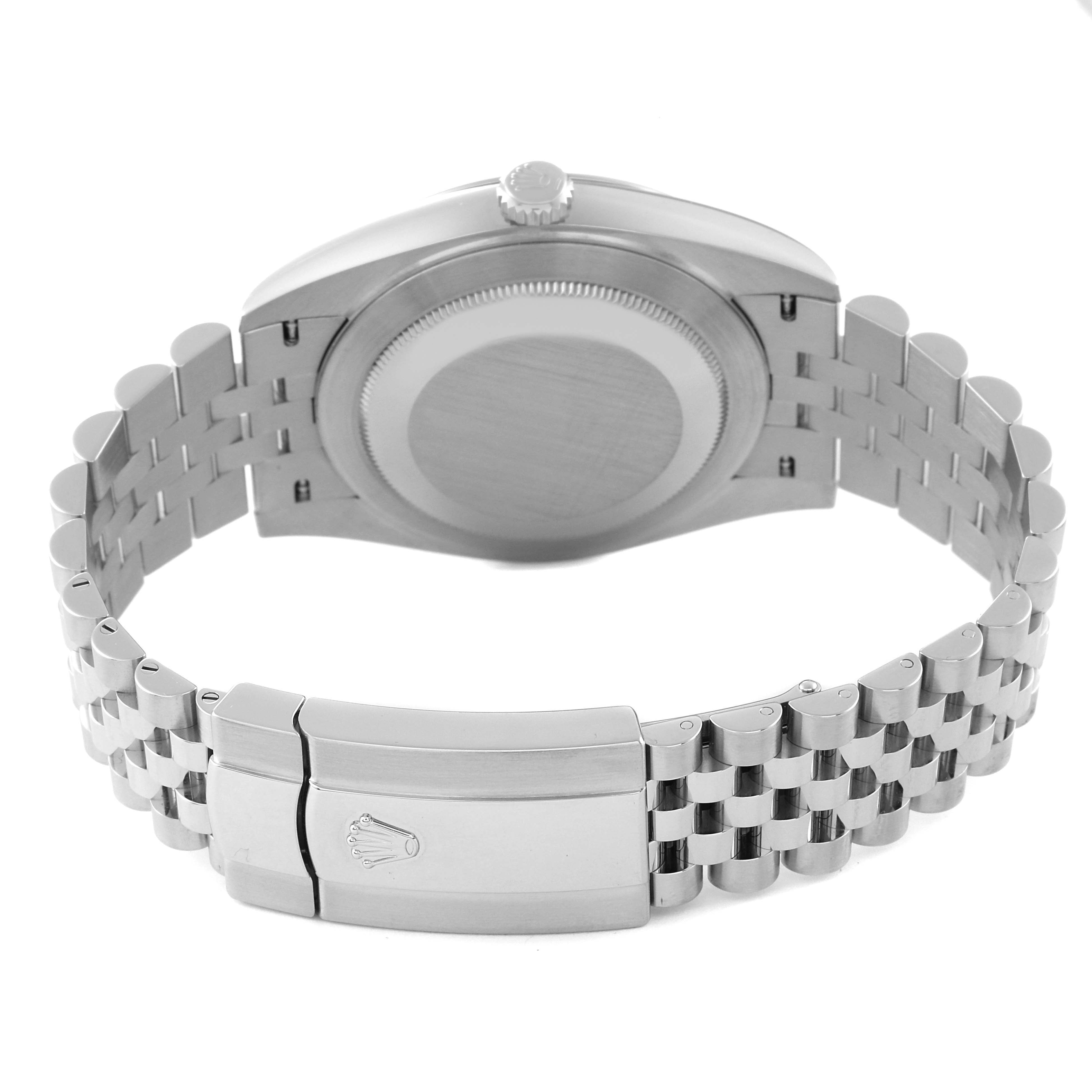 The image shows the back case and bracelet clasp of a Rolex Datejust 41 126300 Men
s Stainless Steel Green Dial 126300 Men
s Stainless Steel Green Dial watch.