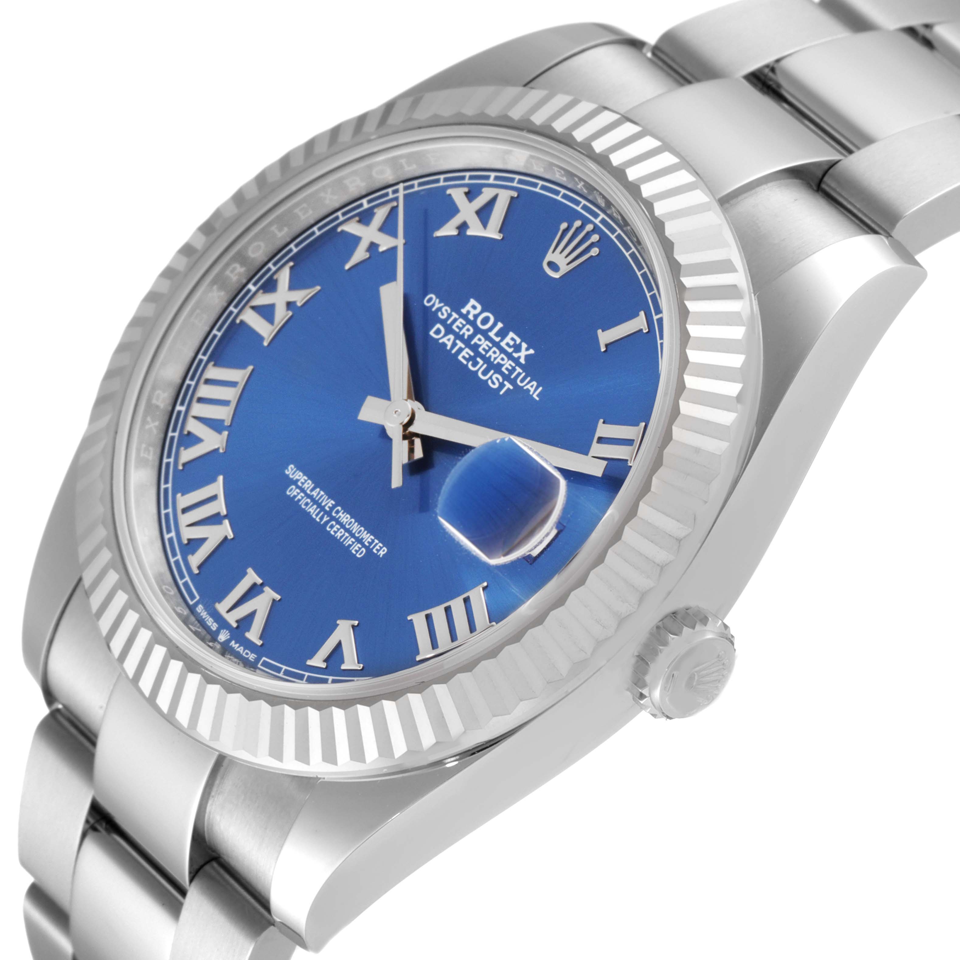 The Rolex Datejust 41 126334 Men's Stainless Steel Blue Dial 126334 Men's Stainless Steel Blue Dial watch is shown at a slight angle, highlighting its blue dial, Roman numerals, bezel, and part of the bracelet.