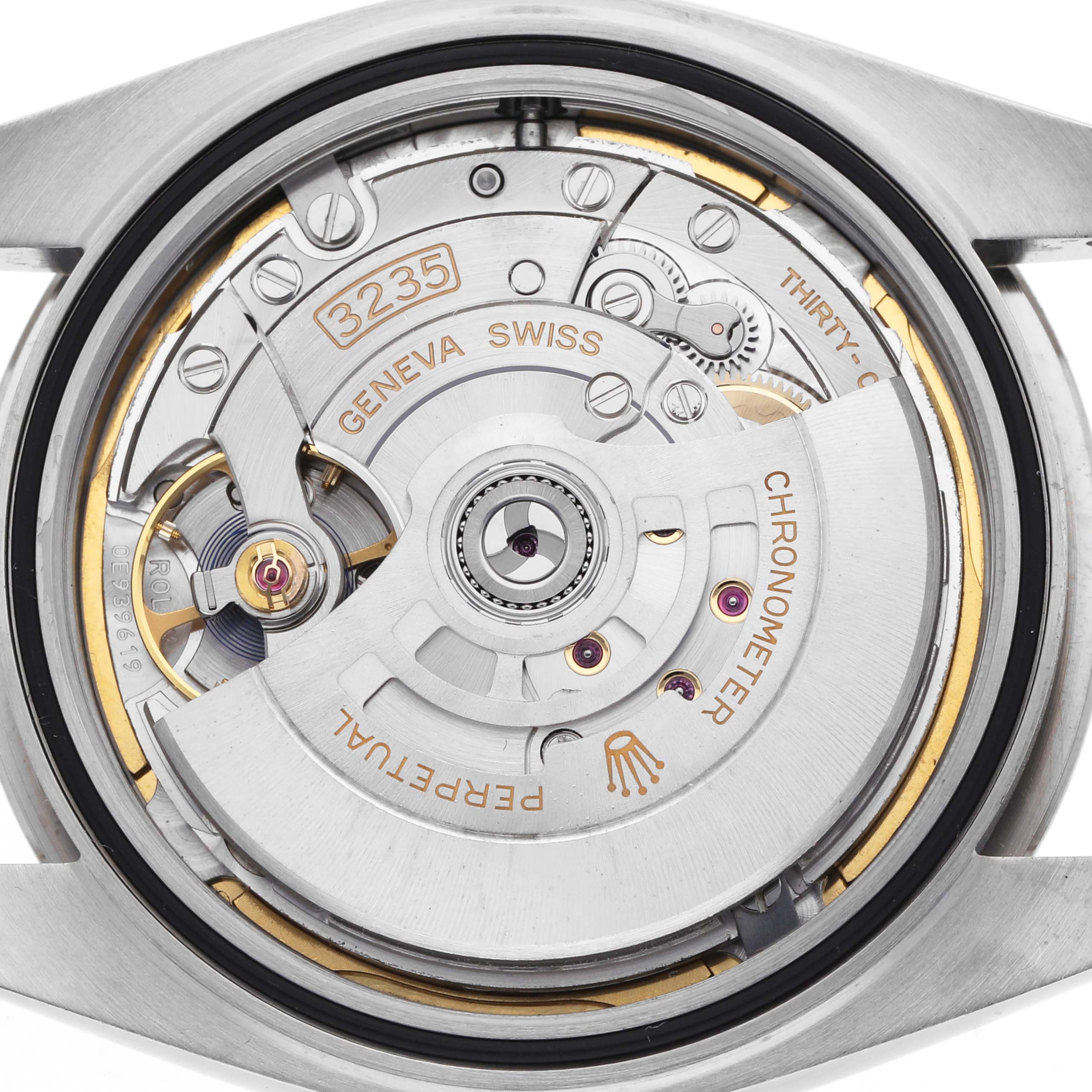 The image shows the movement of a Rolex Datejust 41 126334 Men's Stainless Steel Green Dial 126334 Men's Stainless Steel Green Dial, featuring the intricate internal components from a rear angle.