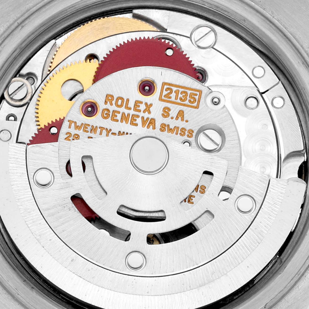 The image shows the intricate internal mechanism of a Rolex Datejust 69173 Women's Steel and Gold (two tone) Champagne Dial 69173 Women's Steel and Gold (two tone) Champagne Dial watch at a close-up angle, revealing gears and components.