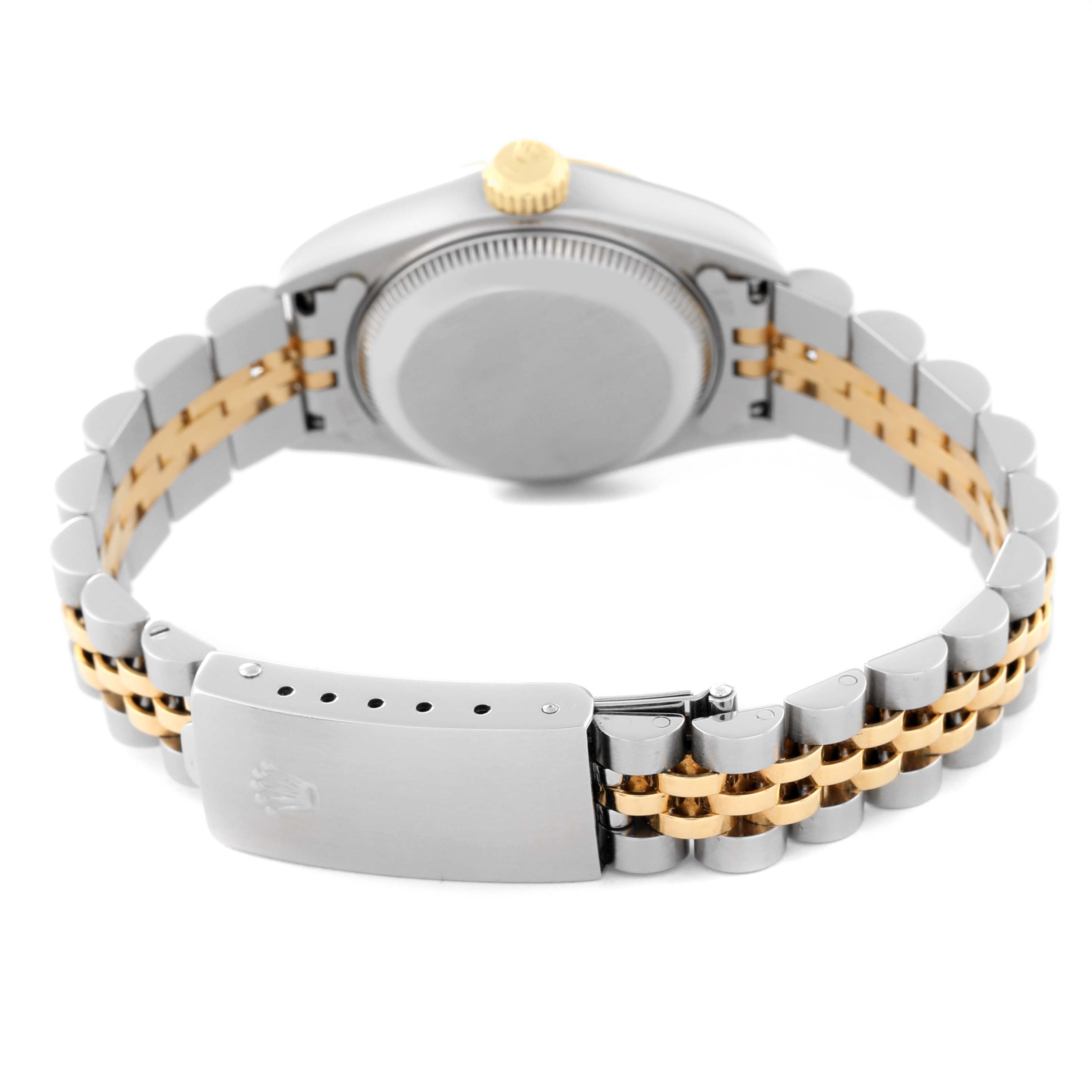 The image shows the back view of a Rolex Datejust 69173 Women's Steel and Gold (two tone) Champagne Dial 69173 Women's Steel and Gold (two tone) Champagne Dial watch, highlighting its case back and two-tone Jubilee bracelet with a clasp.