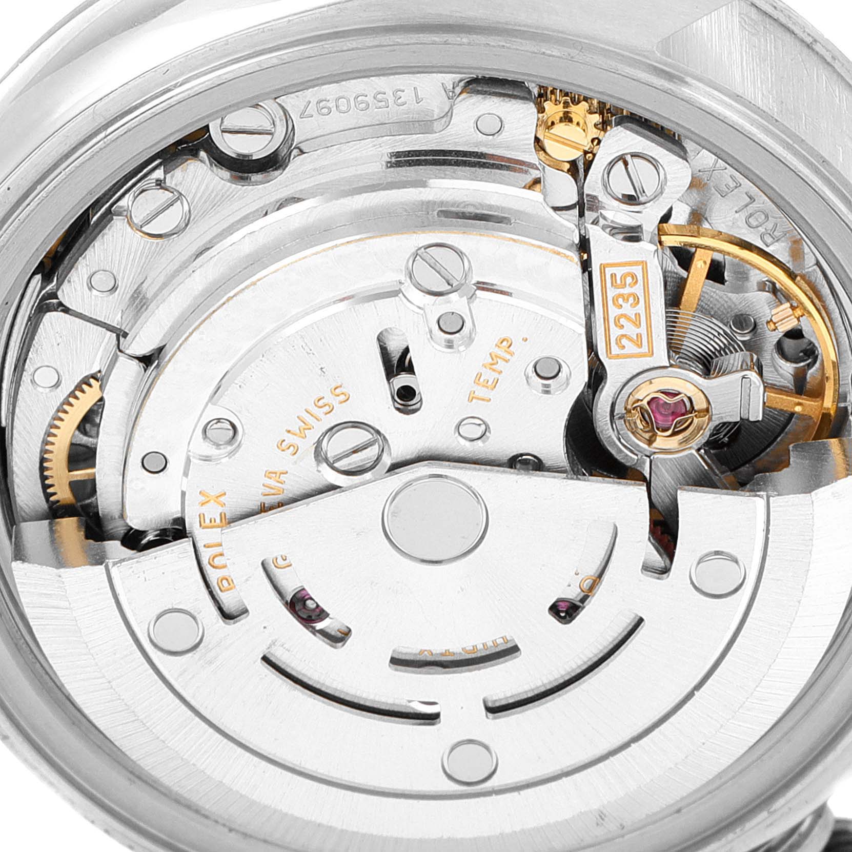 This image shows the intricate internal movement mechanism of a Rolex Datejust 79174 Women's Stainless Steel Blue Dial 79174 Women's Stainless Steel Blue Dial watch from a top-down angle.