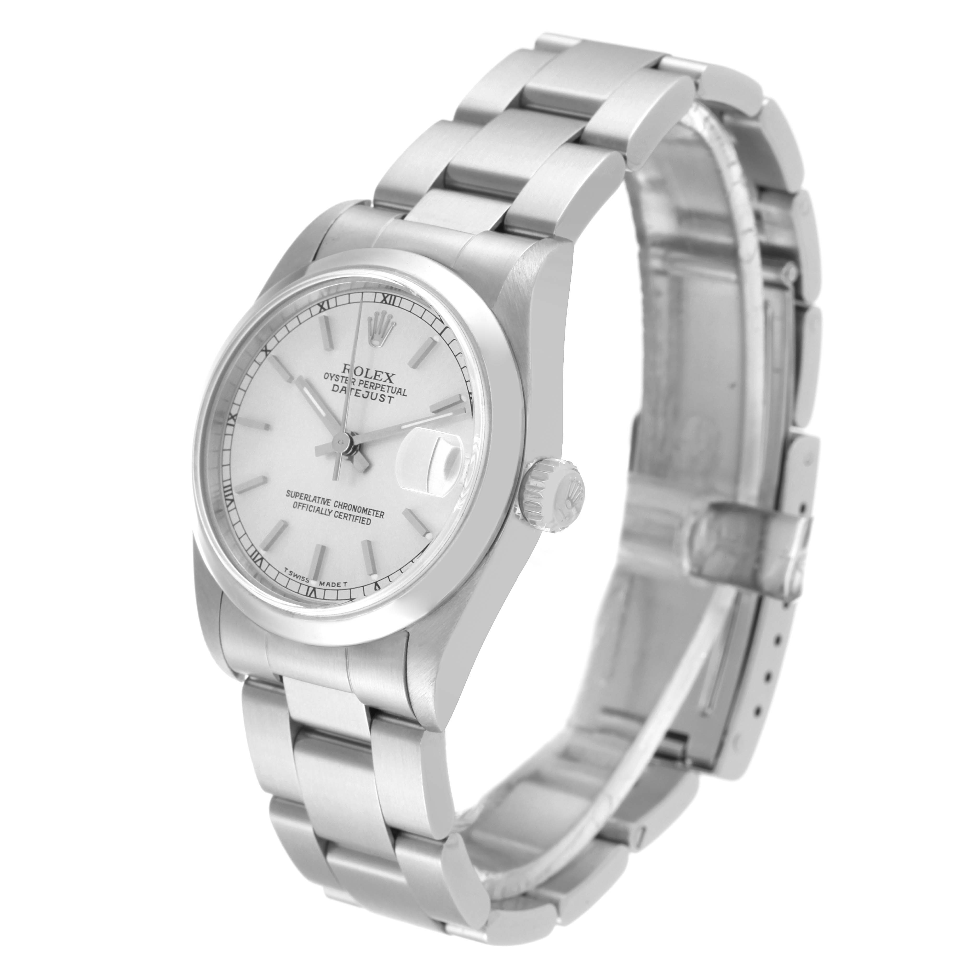 The image shows a Rolex Mid-Size 68240 Women
s Stainless Steel Silver Dial 68240 Women
s Stainless Steel Silver Dial Datejust watch, angled to display the watch face, bracelet, crown, and clasp.