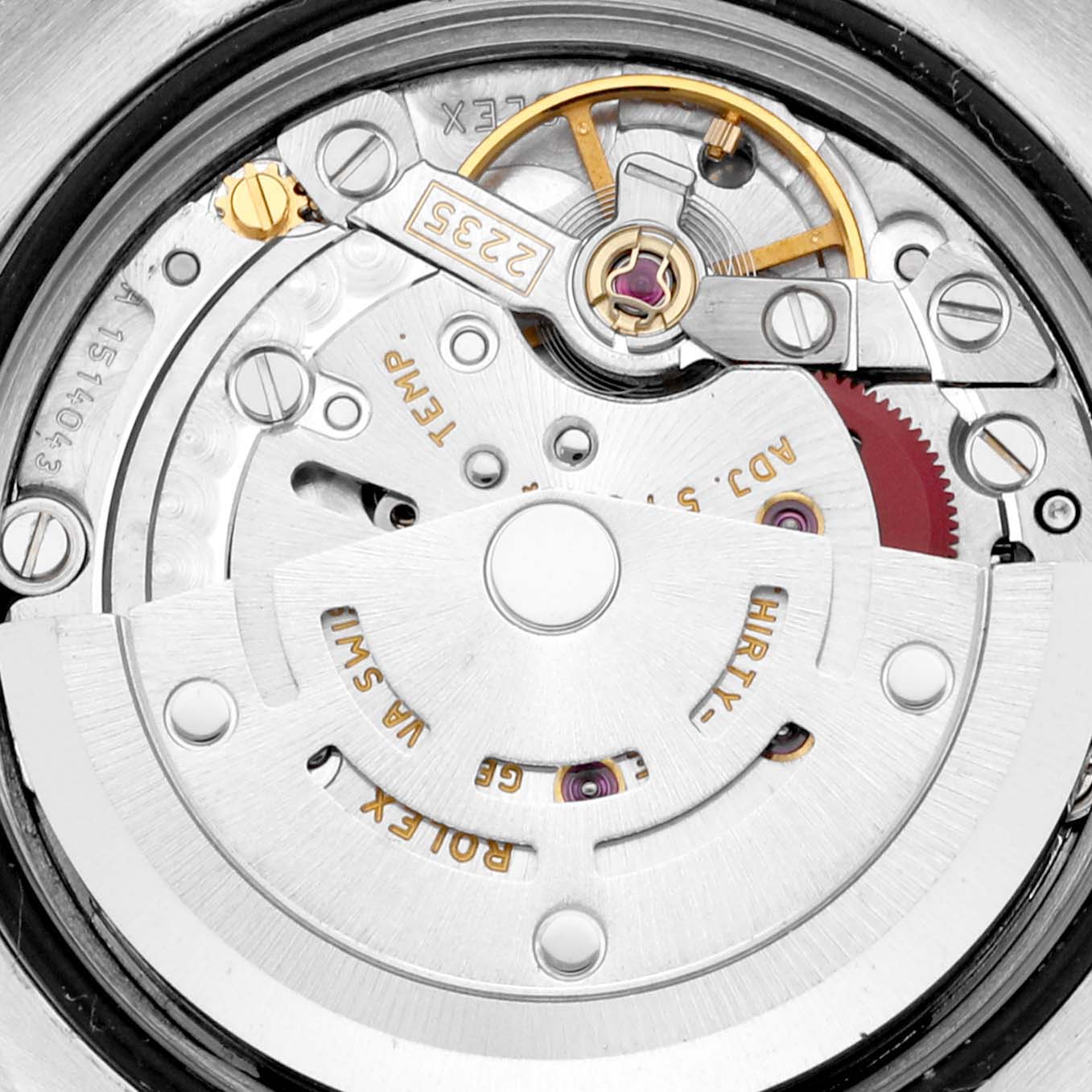 This close-up image shows the intricate inner mechanism of a Rolex Datejust 179171 Women's Steel and Gold (two tone) Silver Dial 179171 Women's Steel and Gold (two tone) Silver Dial watch.