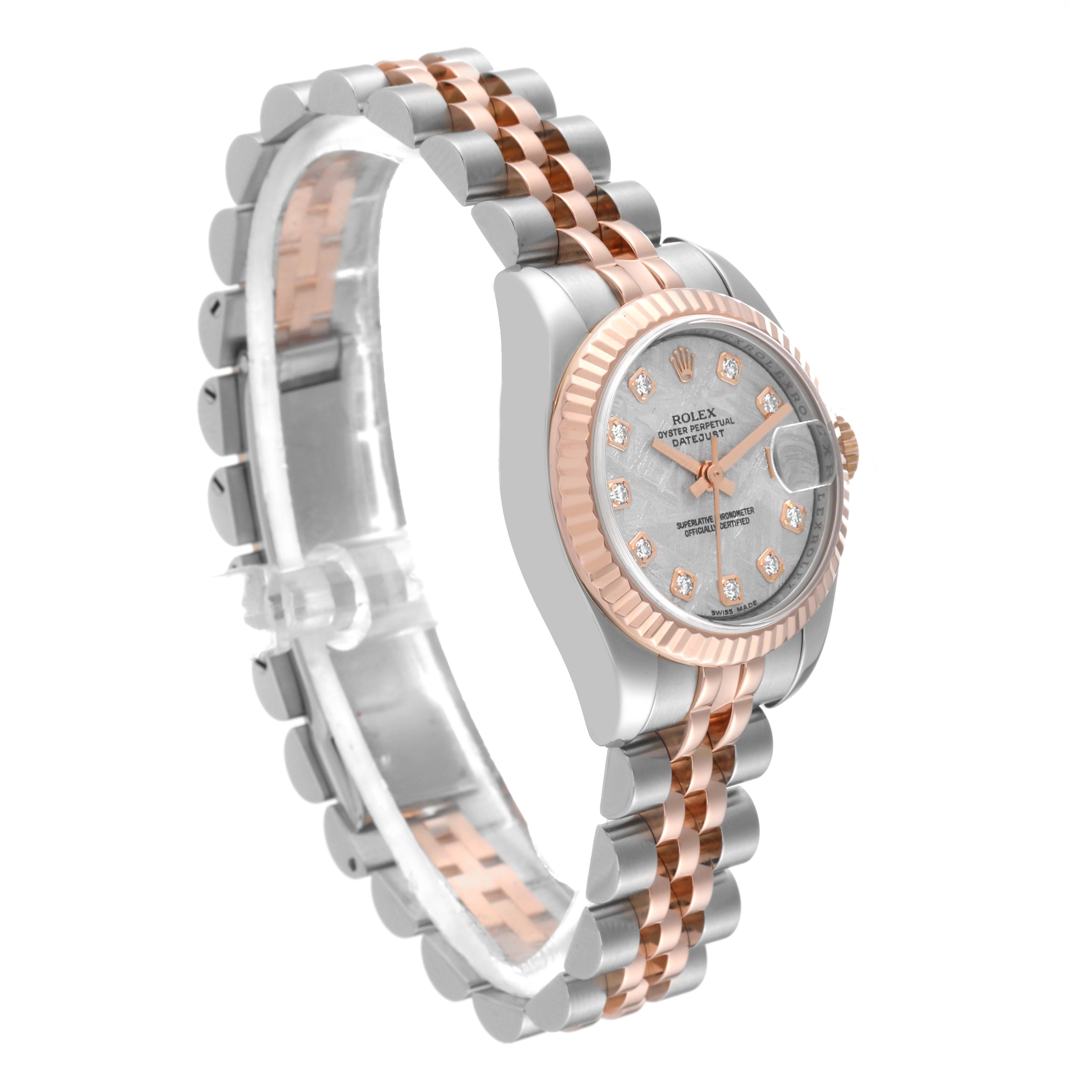 The Rolex Datejust 179171 Women's Steel and Gold (two tone) Silver Dial 179171 Women's Steel and Gold (two tone) Silver Dial watch is shown at an angle highlighting the side, face, and two-tone bracelet with a fluted bezel.