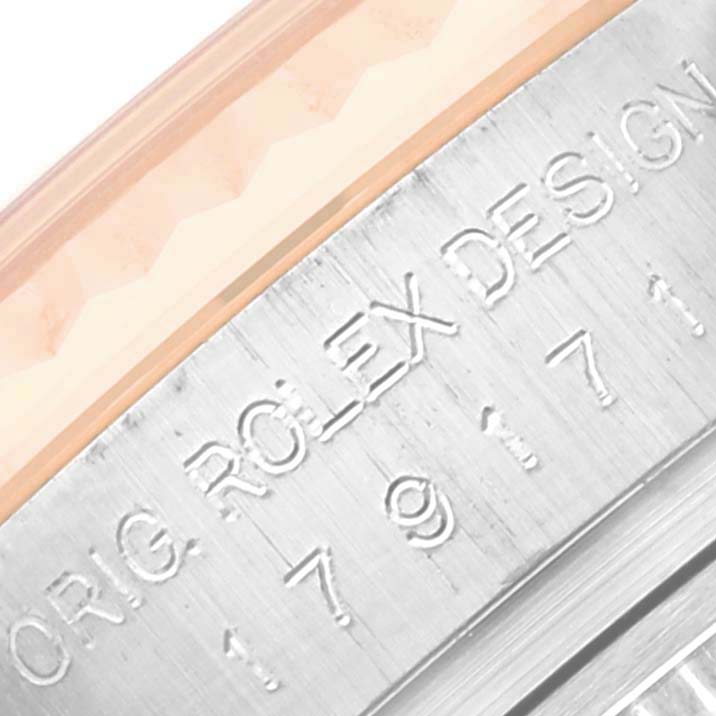 The image shows a close-up of the case side and engravings on a Rolex Datejust 179171 Women's Steel and Gold (two tone) Mother of Pearl Dial 179171 Women's Steel and Gold (two tone) Mother of Pearl Dial model.