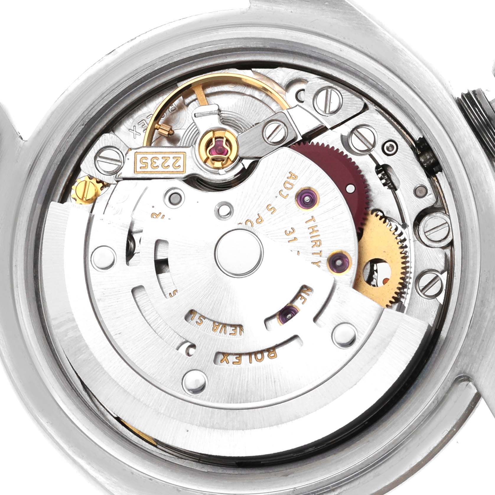 This is a close-up image of the Datejust Rolex watch movement, showcasing its internal mechanical parts.