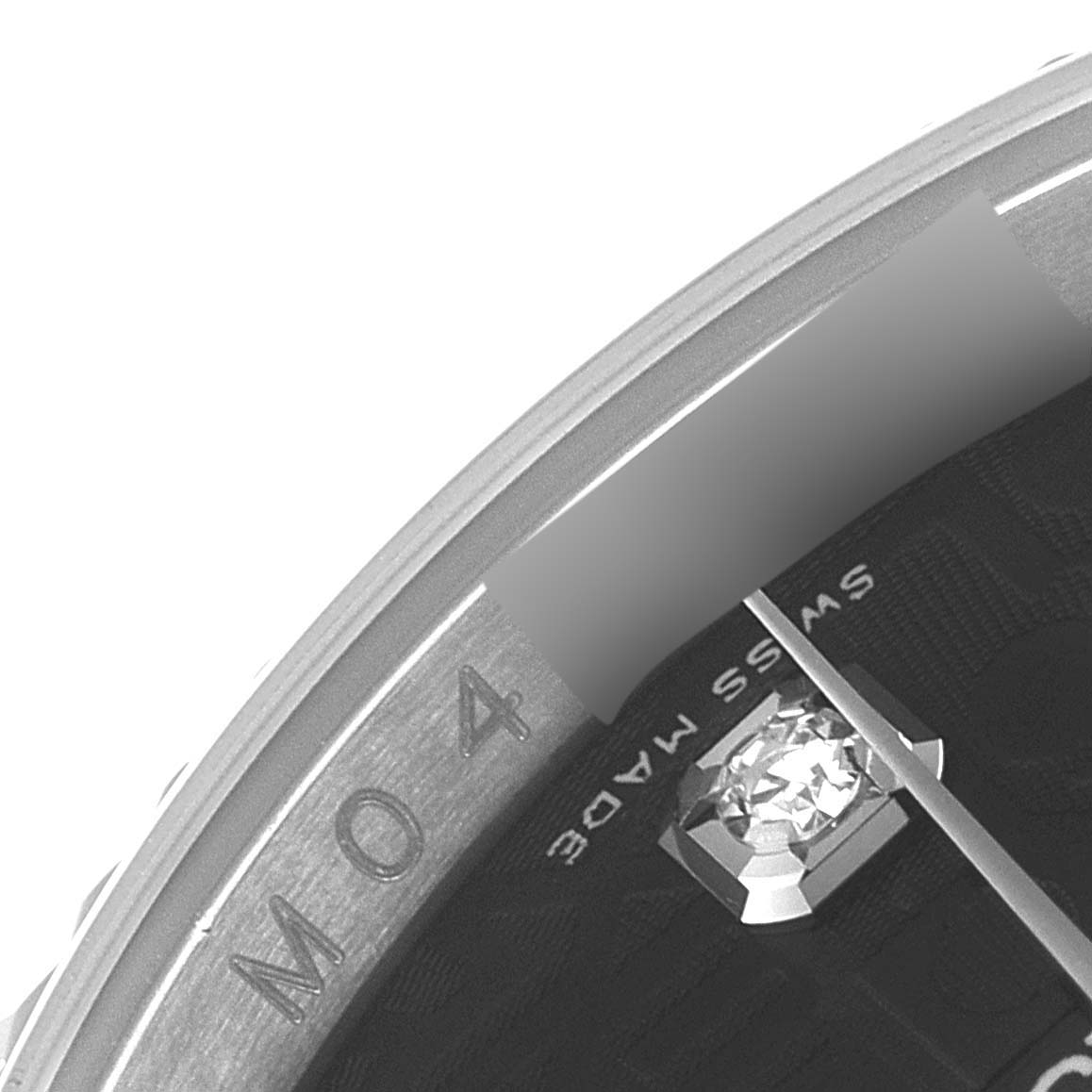 The image shows a close-up of the dial and bezel edge of the Rolex Datejust 116234 Men
s Stainless Steel Black Dial 116234 Men
s Stainless Steel Black Dial watch, highlighting the "Swiss Made" marking.