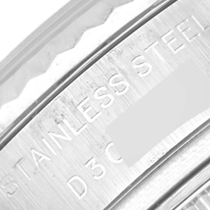 The image shows a close-up angle of the stainless steel case back of a Rolex Datejust 179174 Women's Stainless Steel Mother of Pearl Dial 179174 Women's Stainless Steel Mother of Pearl Dial watch.