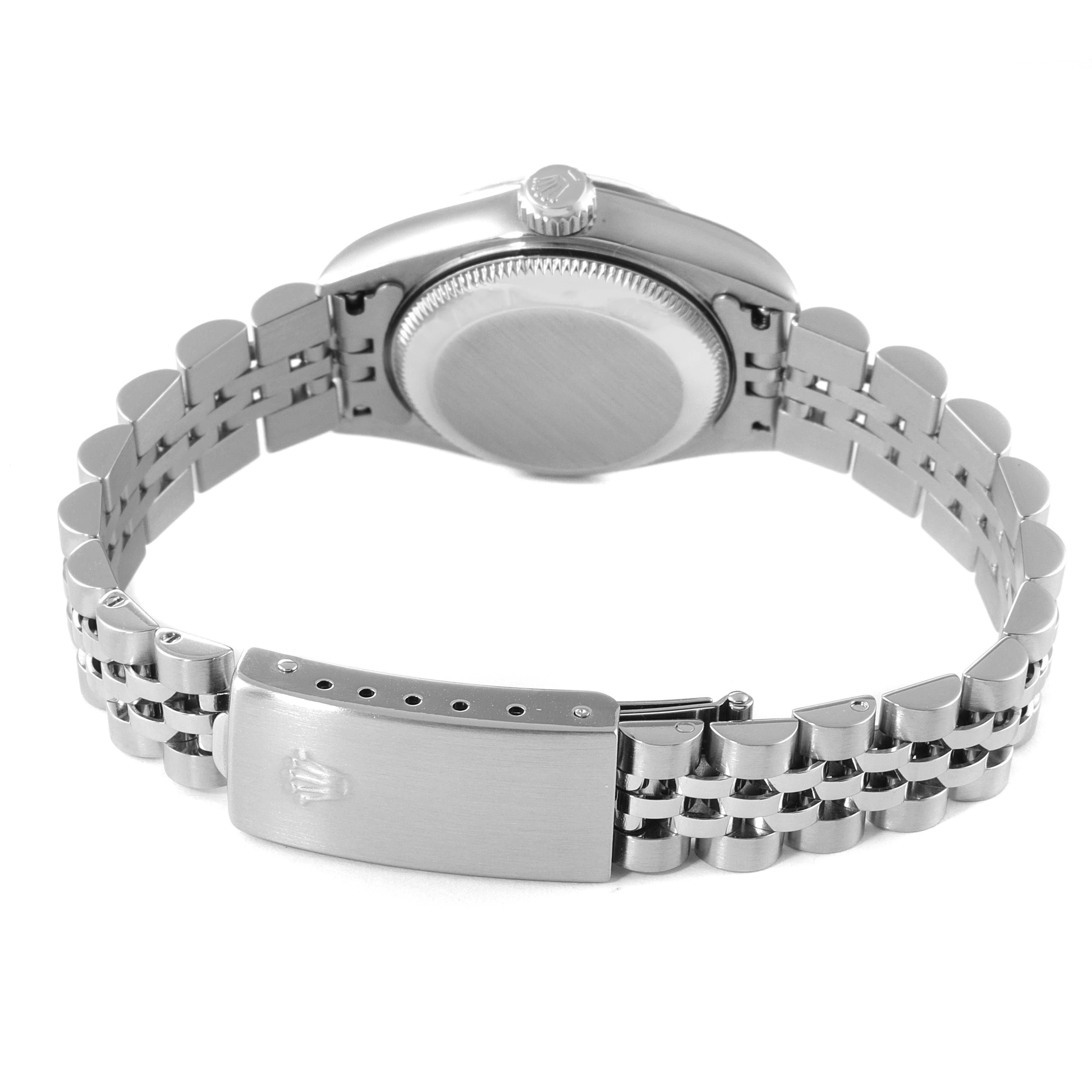 The image shows the back view of a Rolex Datejust 79174 Women's Stainless Steel Pink Dial 79174 Women's Stainless Steel Pink Dial watch, highlighting the case back and stainless steel bracelet with clasp.