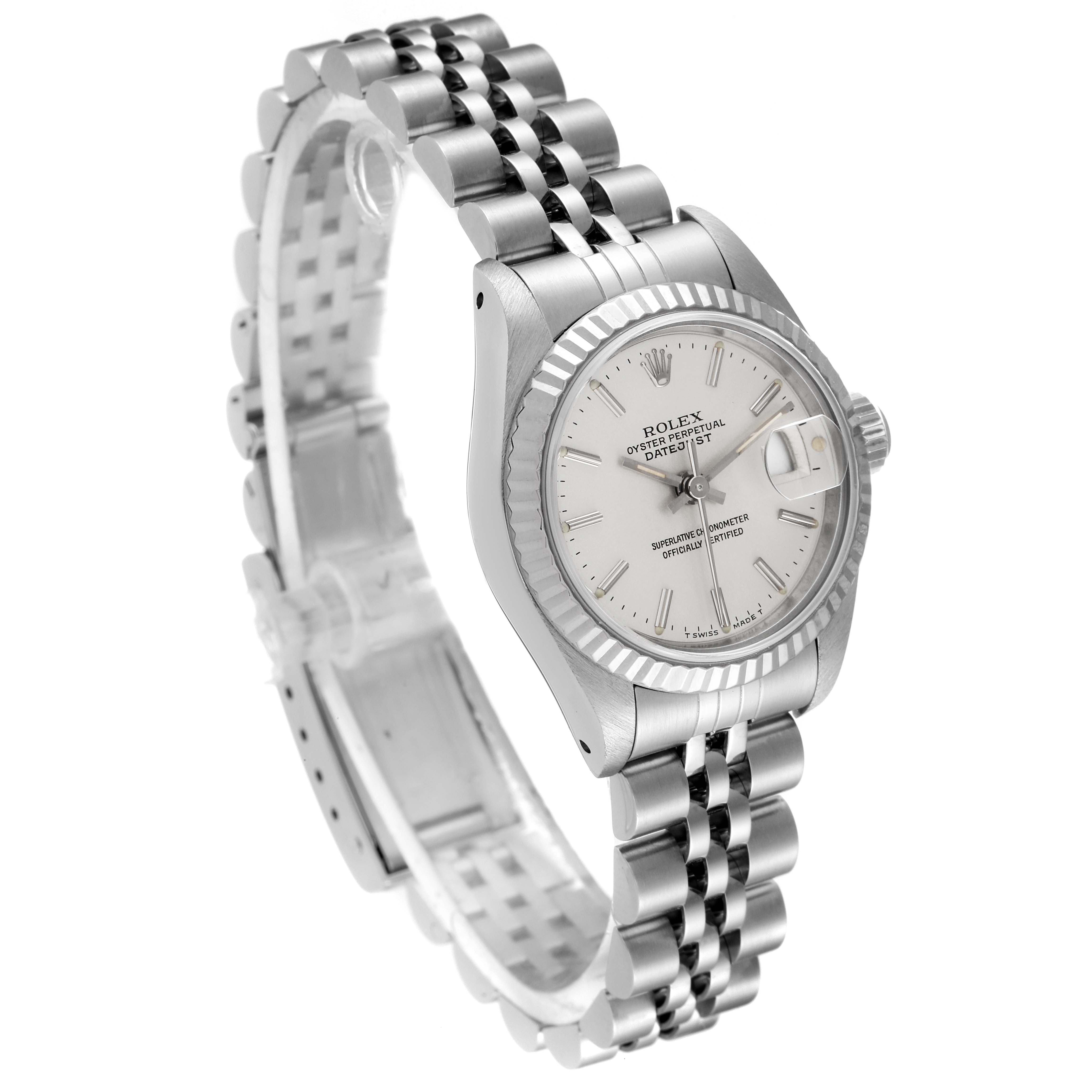 This image shows a Rolex Datejust 69174 Women's Stainless Steel Silver Dial 69174 Women's Stainless Steel Silver Dial watch at an angled view, highlighting the face, fluted bezel, and Jubilee bracelet.