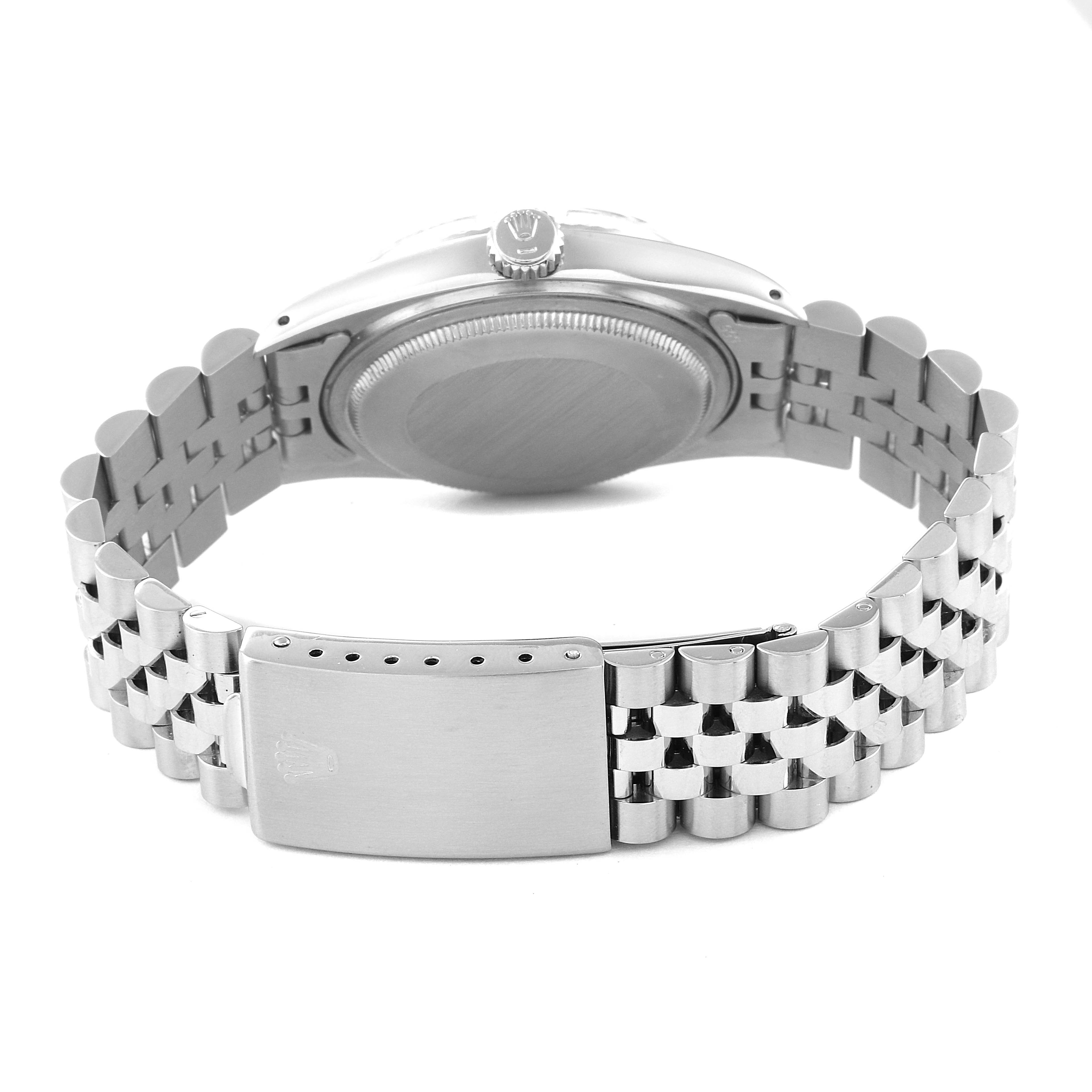 The image shows the back view of a Rolex Vintage Collection 16014 Men's Stainless Steel Silver Dial 16014 Men's Stainless Steel Silver Dial watch, highlighting the case back, crown, and bracelet.