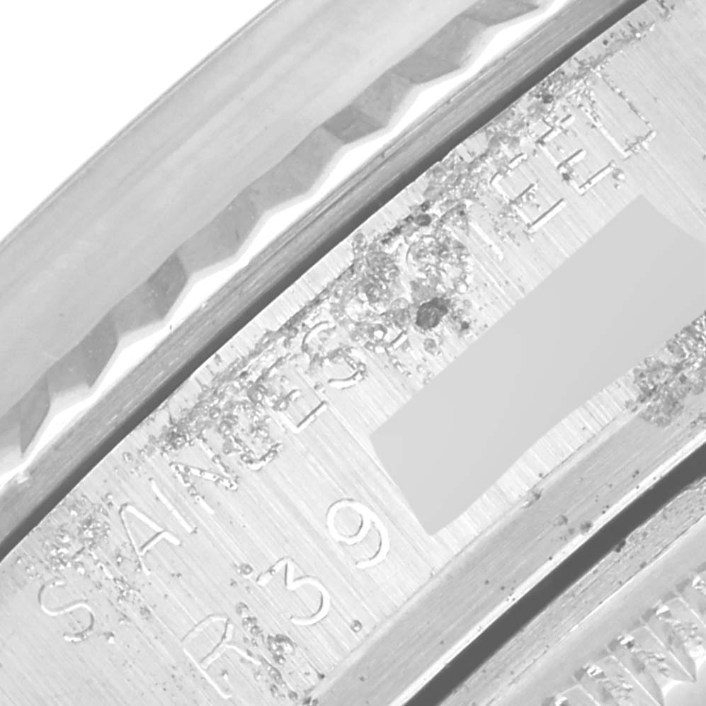 This close-up image shows the casing and serial number engraving of a Rolex Vintage Collection 16014 Men
s Stainless Steel Silver Dial 16014 Men
s Stainless Steel Silver Dial watch.