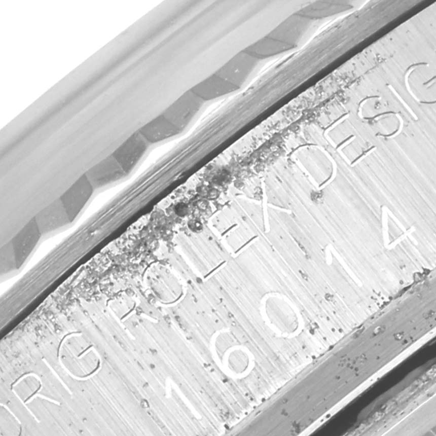 The image shows a close-up of the case side and bezel of a Vintage Collection Rolex watch, displaying part of the model number.