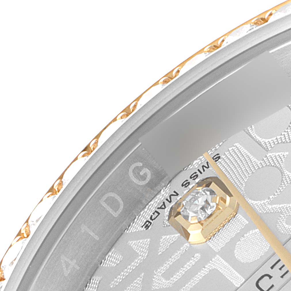 The close-up image shows part of the dial, bezel, and the diamond marker of a Rolex Datejust 116243 Men's Steel and Gold (two tone) Silver Dial 116243 Men's Steel and Gold (two tone) Silver Dial watch.