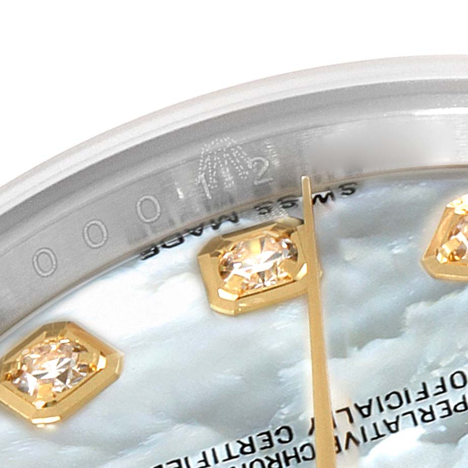 This close-up image of a Rolex Datejust 179173 Women's Steel and Gold (two tone) Mother of Pearl Dial 179173 Women's Steel and Gold (two tone) Mother of Pearl Dial watch shows the dial with diamond hour markers and partial text, viewed from an angled perspective.