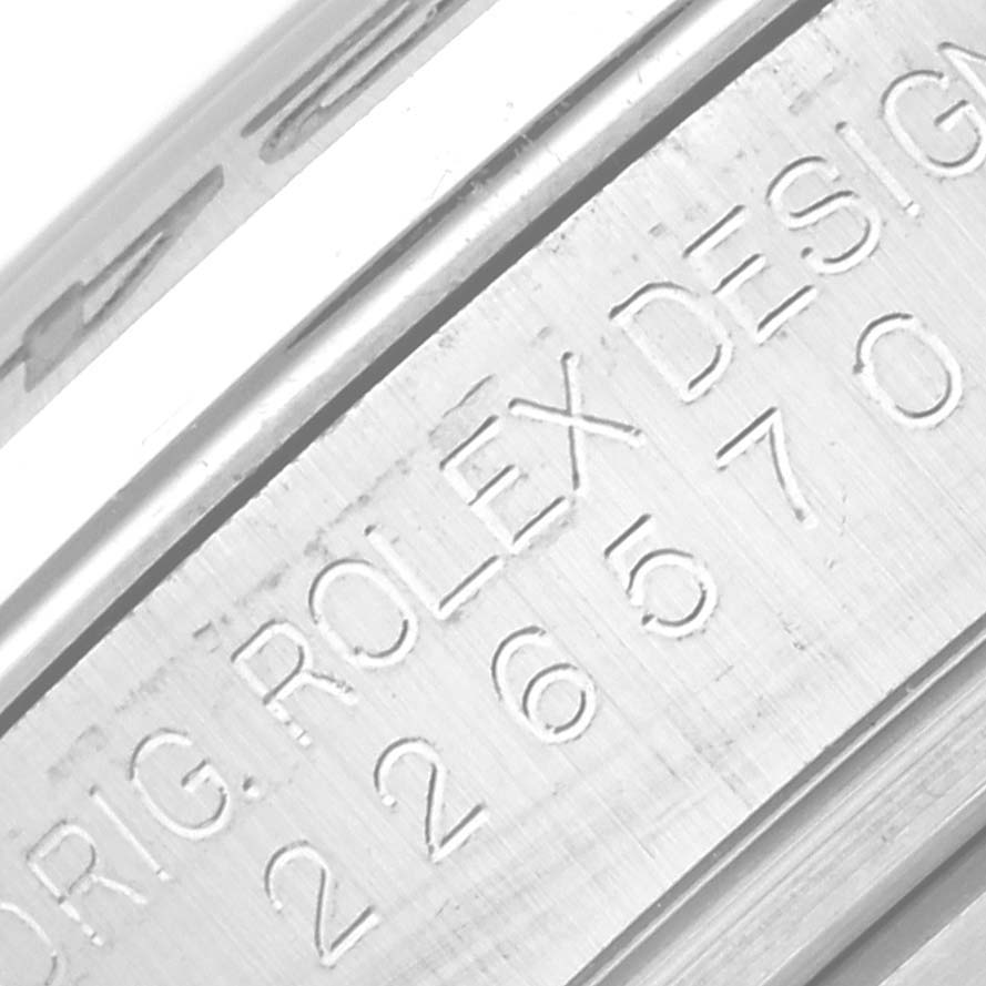 Close-up view of the inner engraving on a Rolex Explorer 226570 Men
s Stainless Steel Black Dial 226570 Men
s Stainless Steel Black Dial model, showing the brand name and design number.