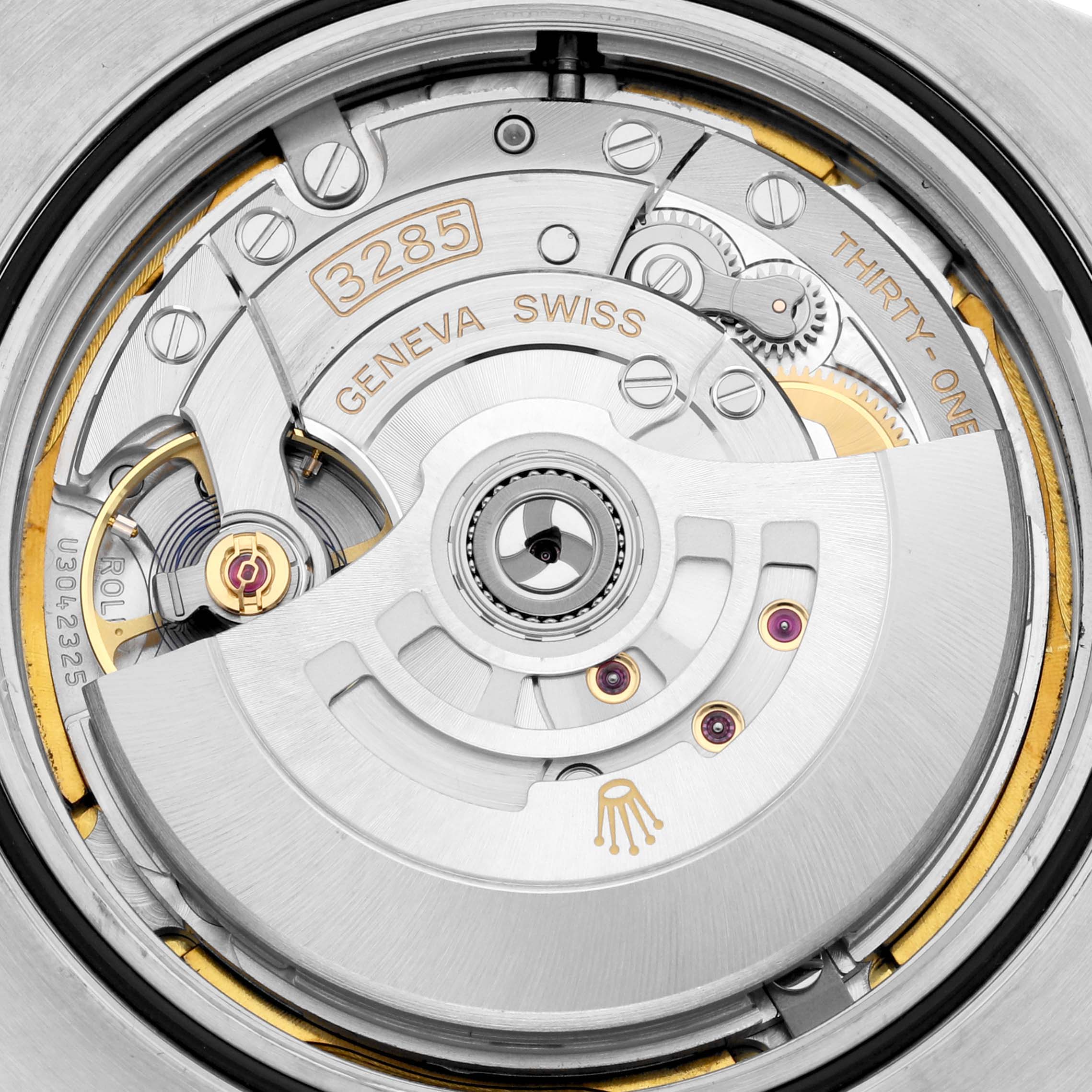 This image shows a close-up of the Rolex Explorer 226570 Men
s Stainless Steel Black Dial 226570 Men
s Stainless Steel Black Dial
s 3285 movement, highlighting the intricate gears and Geneva Striping.