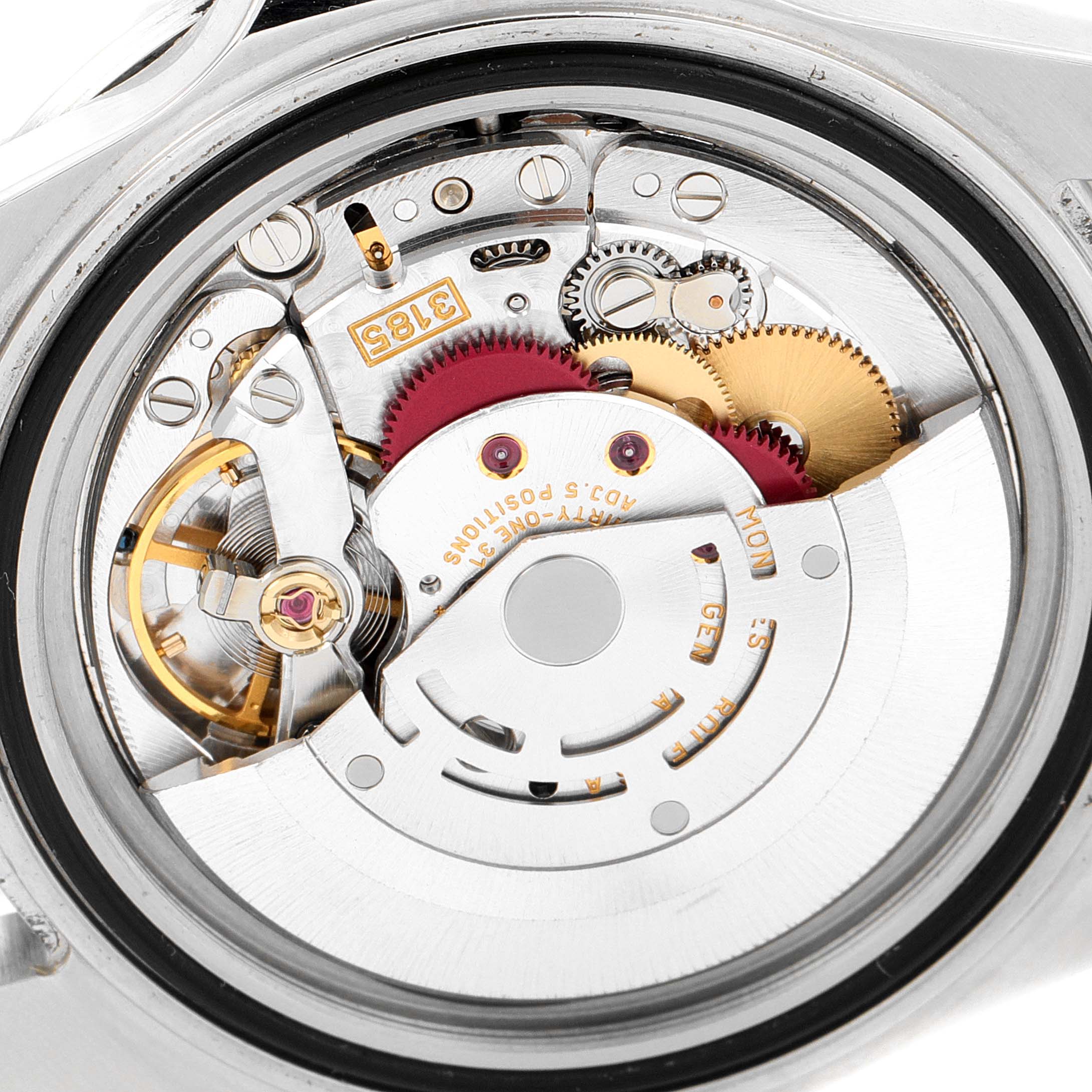 This image shows the exposed internal movement mechanism of a Rolex GMT-Master 16710 Men
s Stainless Steel Black Dial 16710 Men
s Stainless Steel Black Dial watch from a close-up angle.