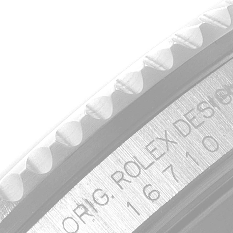 The close-up image showcases the engraved side profile of the bezel and the serial number of the Rolex GMT-Master 16710 Men
s Stainless Steel Black Dial 16710 Men
s Stainless Steel Black Dial watch.