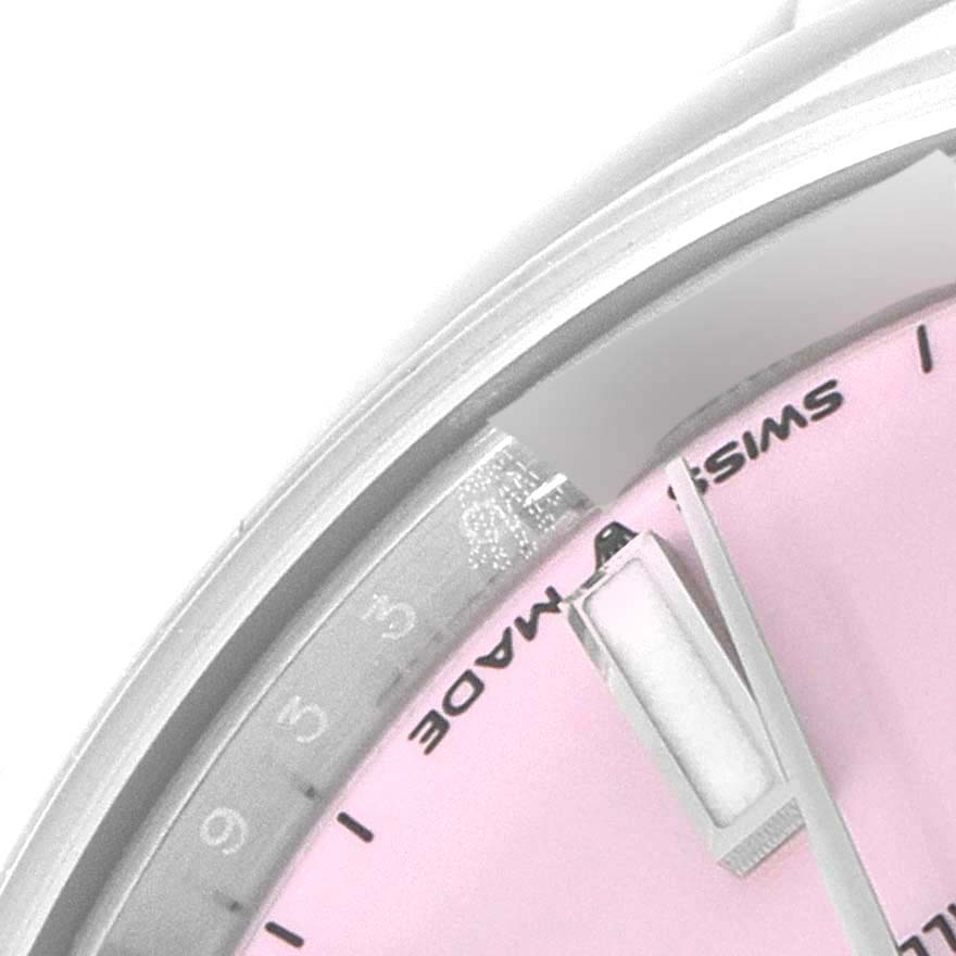 The image shows a close-up of the dial and hands portion of the Rolex Mid-Size 277200 Women's Stainless Steel Pink Dial 277200 Women's Stainless Steel Pink Dial watch.