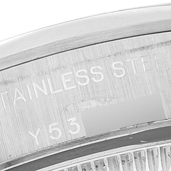 The image shows a close-up of the caseback engraving on a Rolex Oyster Perpetual 76080 Women's Stainless Steel Silver Dial 76080 Women's Stainless Steel Silver Dial watch.