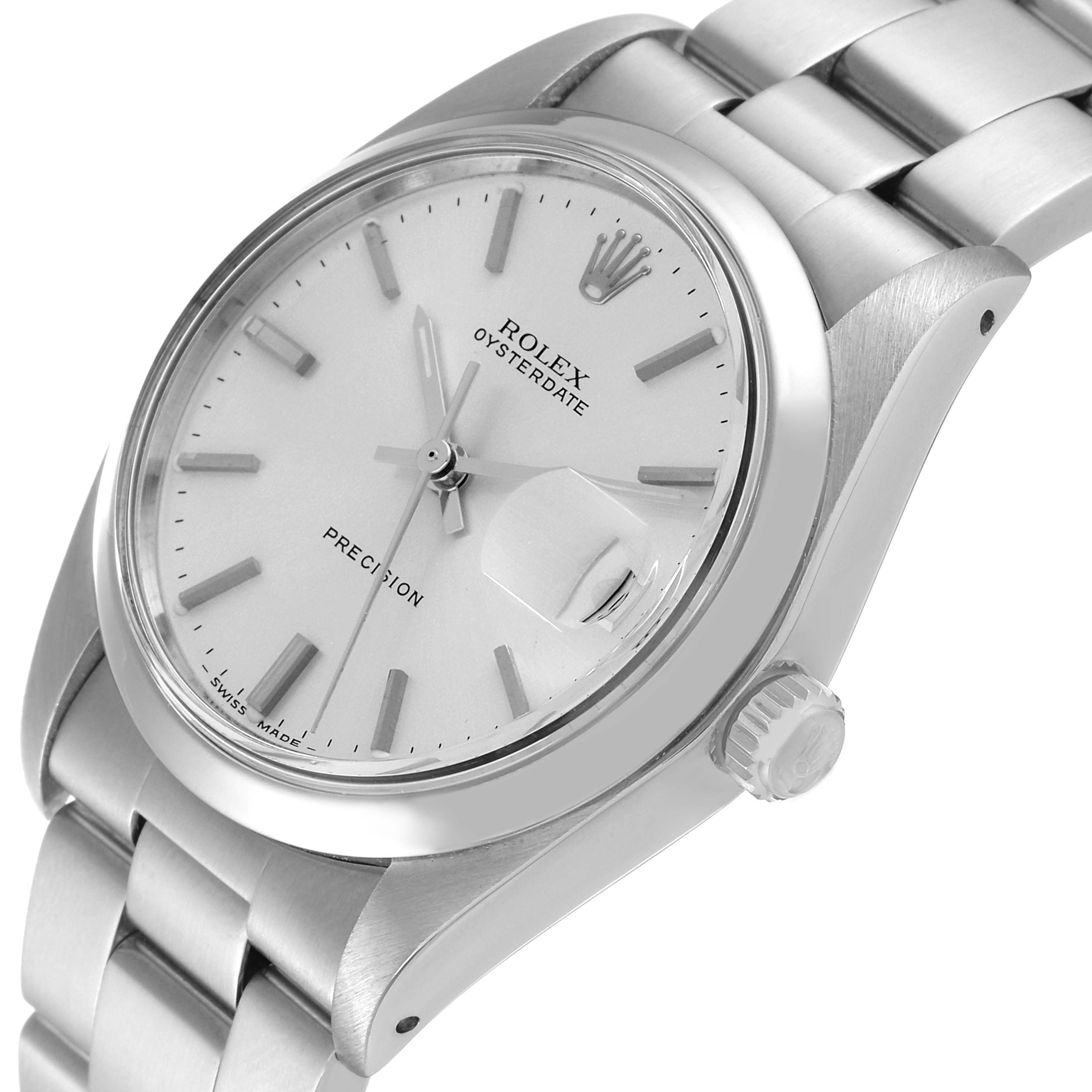 The image shows a close-up of the Rolex Vintage Collection 6694 Men
s Stainless Steel Silver Dial 6694 Men
s Stainless Steel Silver Dial watch, displaying the face, crown, and part of the bracelet at an angle.