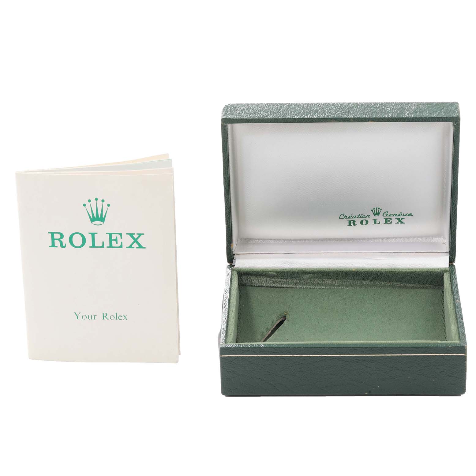 The image shows an empty green Rolex box and the accompanying manual for the Vintage Collection model by Rolex.
