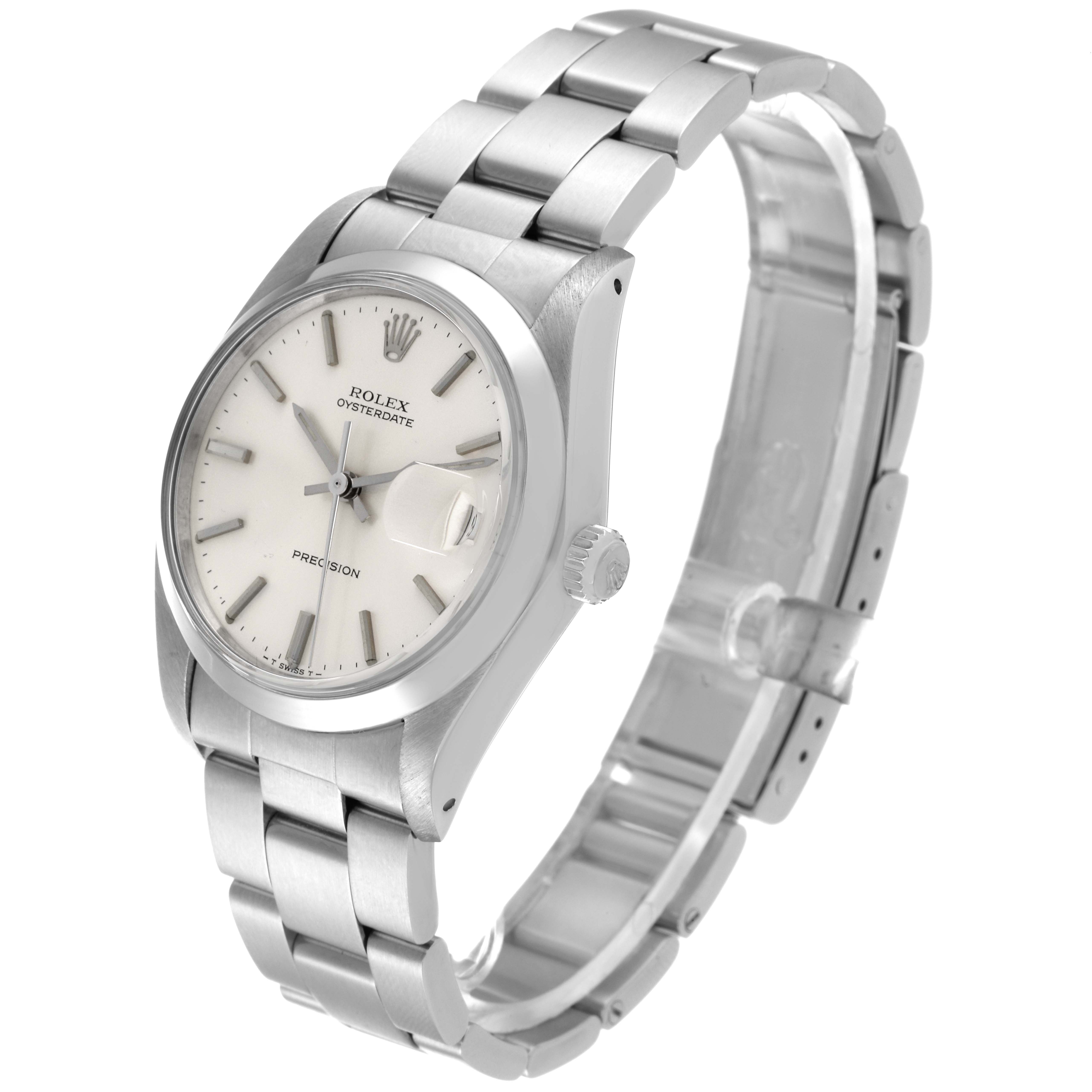 The image shows a Rolex Vintage Collection 6694 Men
s Stainless Steel Silver Dial 6694 Men
s Stainless Steel Silver Dial Oysterdate watch viewed from a slight side angle, displaying the face, crown, and bracelet.