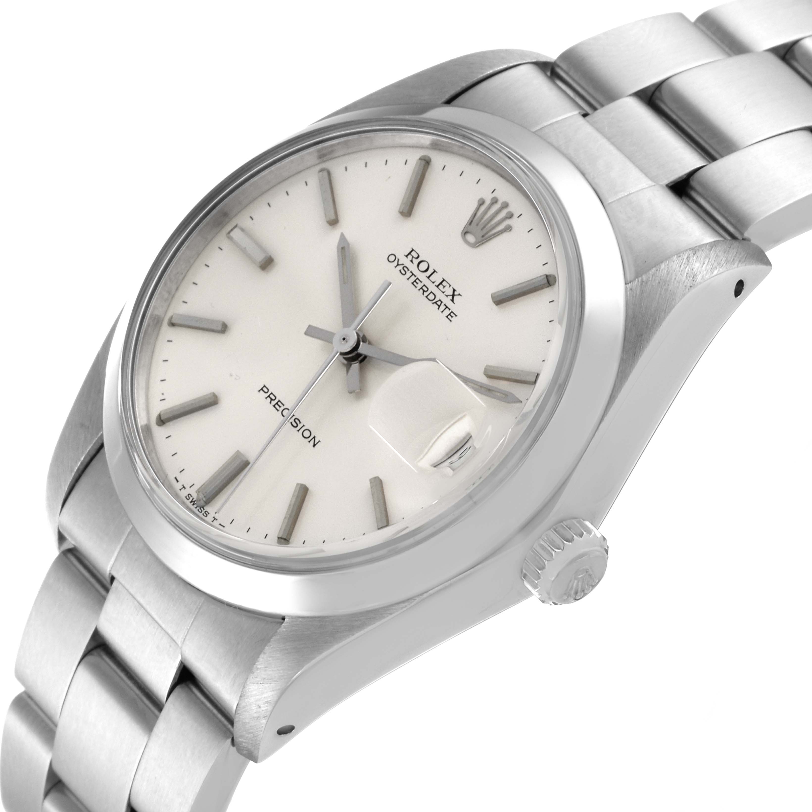 The image shows a close-up of the Rolex Vintage Collection 6694 Men
s Stainless Steel Silver Dial 6694 Men
s Stainless Steel Silver Dial watch at a slight angle, highlighting its face, bezel, crown, and part of the band.