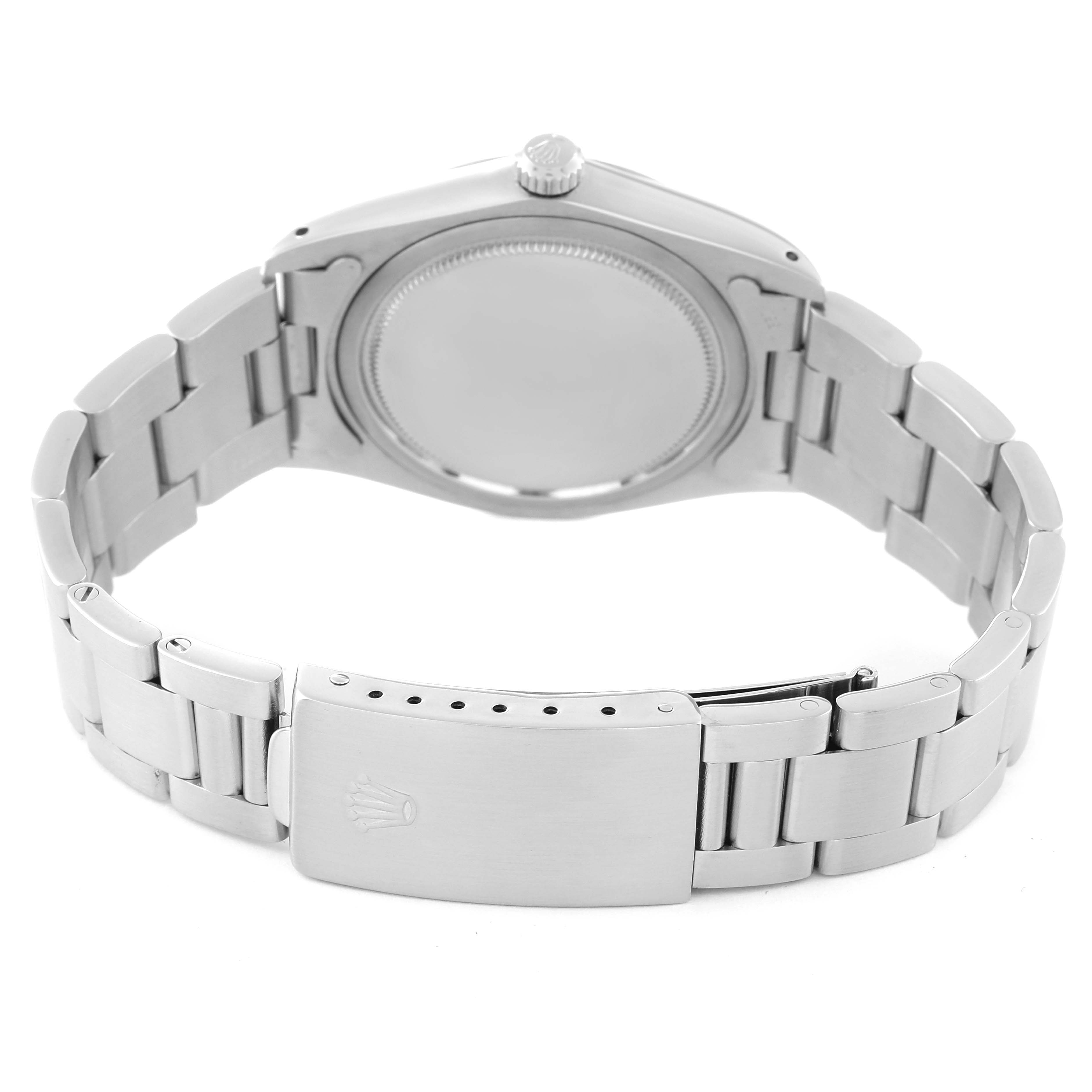 The image shows the back view and bracelet of the Rolex Vintage Collection 6694 Men
s Stainless Steel Silver Dial 6694 Men
s Stainless Steel Silver Dial watch, including the clasp with the Rolex logo.