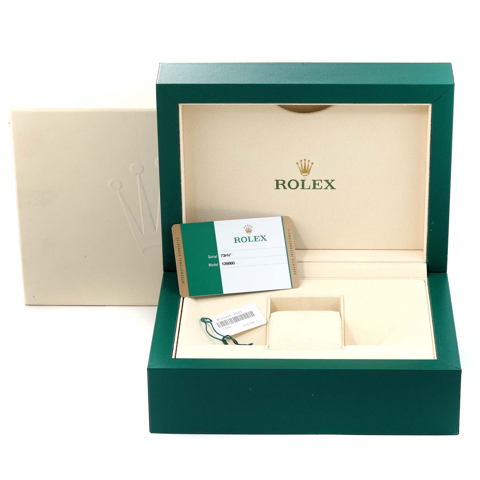 This image shows the open packaging box and accessories of the Rolex Sea-Dweller 126660 Men
s Stainless Steel Blue Dial 126660 Men
s Stainless Steel Blue Dial watch, including a card and a tag.