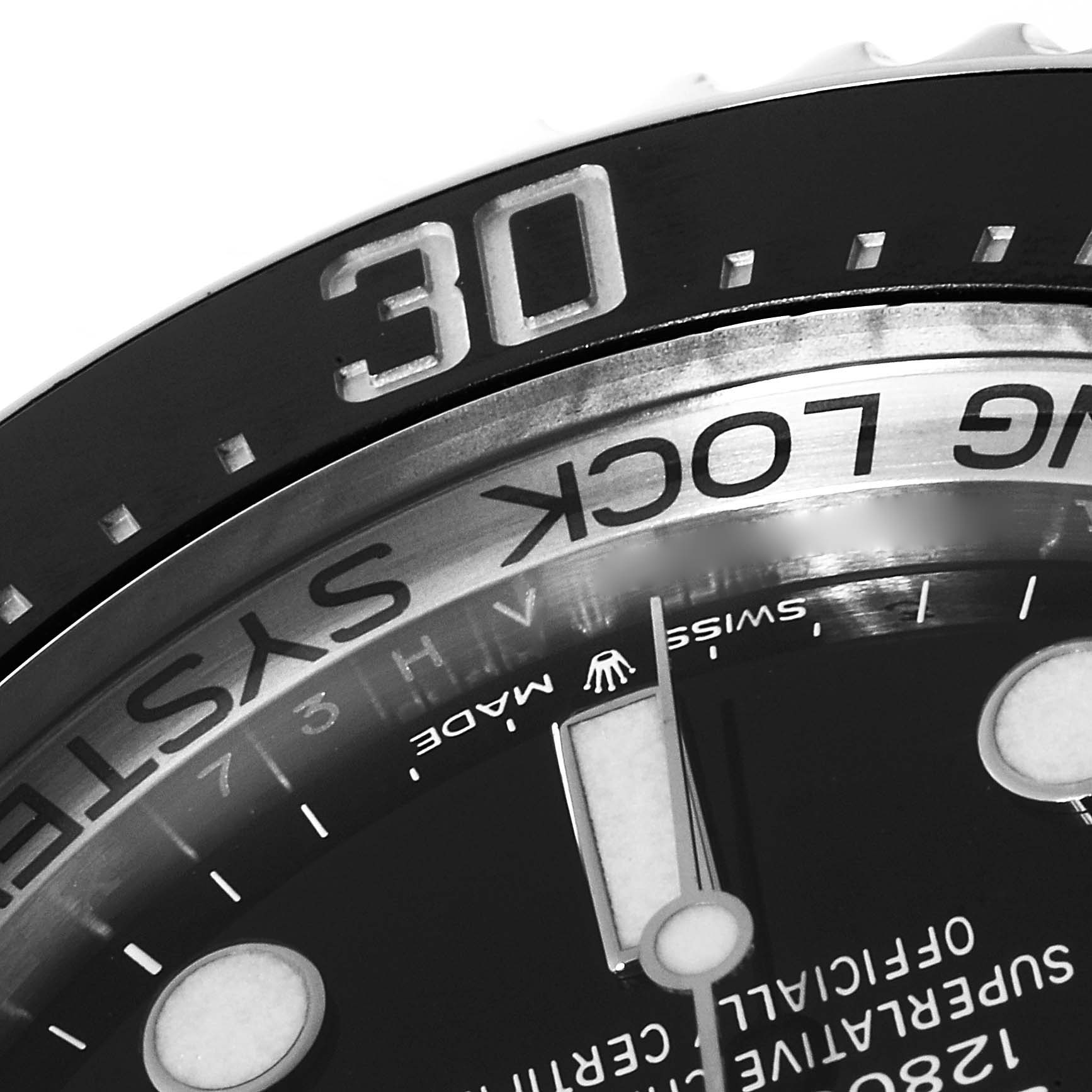 The image shows a close-up of the dial and bezel of a Rolex Sea-Dweller 126660 Men
s Stainless Steel Blue Dial 126660 Men
s Stainless Steel Blue Dial watch, featuring the 30-minute mark and part of the text on the dial.