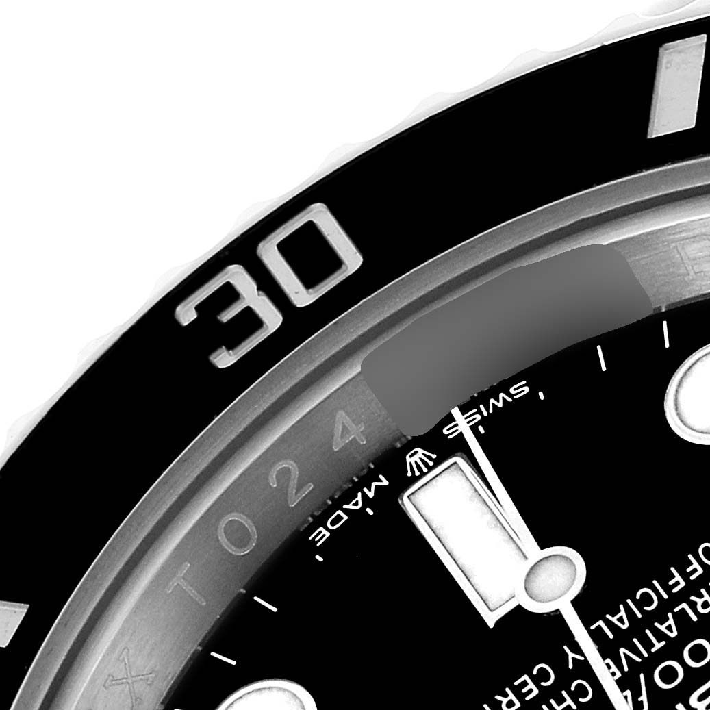 The image shows a close-up of the bezel and part of the dial of a Rolex Submariner 126610 Men
s Stainless Steel Black Dial 126610 Men
s Stainless Steel Black Dial, focusing on the "30" mark.