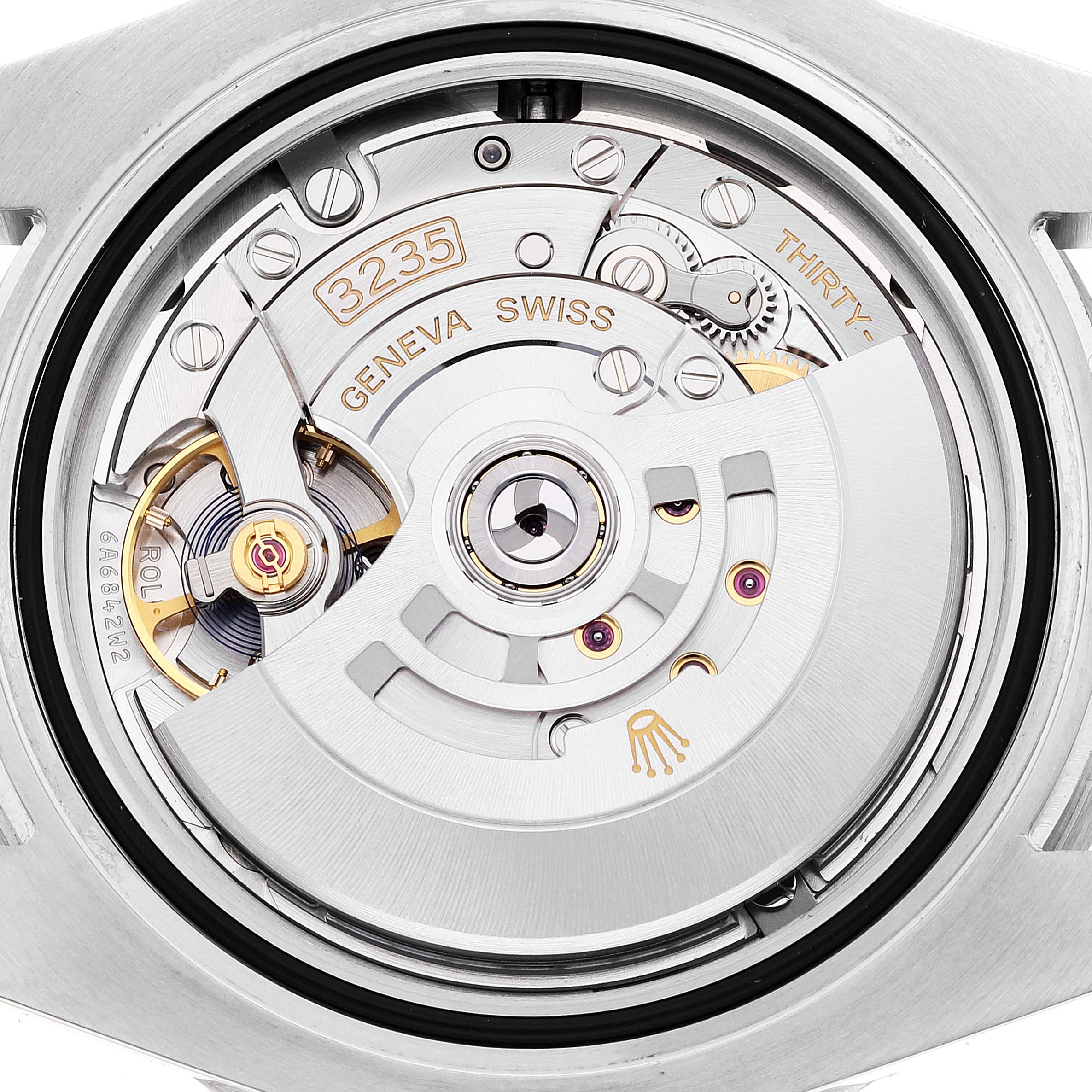 A close-up view of the Rolex Submariner 126610 Men
s Stainless Steel Black Dial 126610 Men
s Stainless Steel Black Dial
s movement, showcasing the intricate inner mechanics and the rotor with 3235 markings.