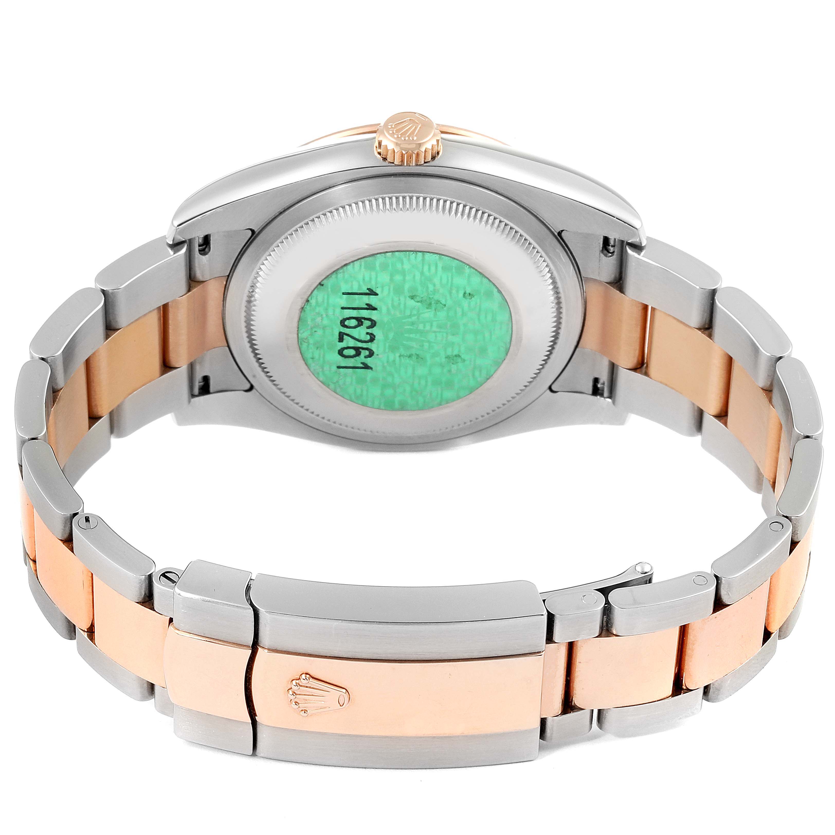 The image shows the back view of a Rolex Turn-o-Graph 116261 Men
s Steel and Gold (two tone) Black Dial 116261 Men
s Steel and Gold (two tone) Black Dial watch, highlighting its bracelet and clasp.