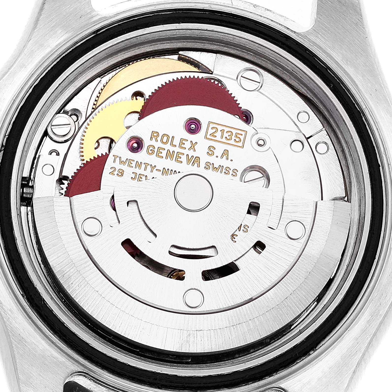 This image shows the internal mechanics and movement of a Rolex Yacht-Master 69623 Women's Steel and Gold (two tone) Blue Dial 69623 Women's Steel and Gold (two tone) Blue Dial watch from a rear angle.