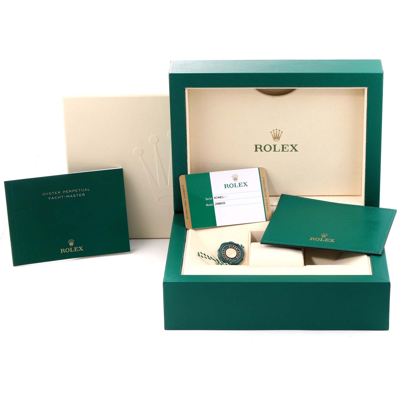 The image shows the packaging and accessories for a Rolex Yacht-Master 268655 Men
s Rose Gold Black Dial 268655 Men
s Rose Gold Black Dial, including the box, booklets, and warranty card.