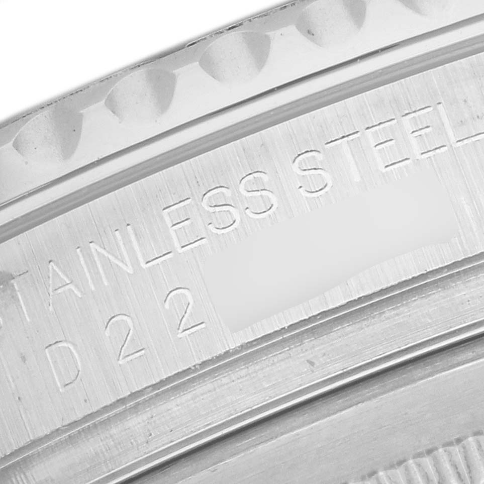 This close-up image shows the engraved markings on the stainless steel back of a Rolex Yacht-Master 16622 Men's Stainless Steel Silver Dial 16622 Men's Stainless Steel Silver Dial watch.