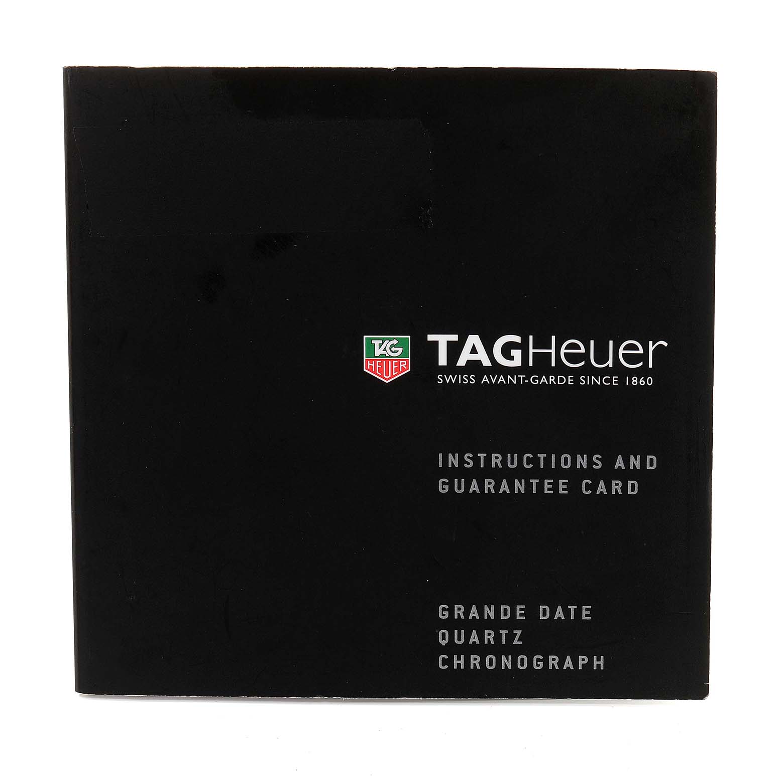 The image shows the instruction and guarantee card for the Tag Heuer Aquaracer CAY1110.BA0927 Men
s Stainless Steel Black Dial CAY1110.BA0927 Men
s Stainless Steel Black Dial Grande Date Quartz Chronograph.