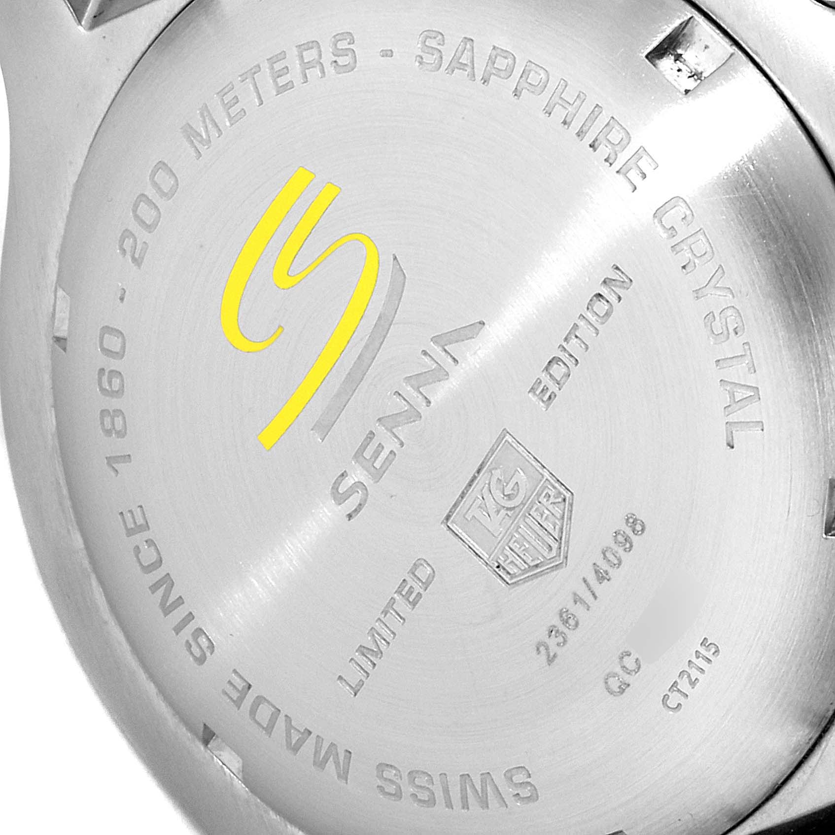The image shows the back case of a Tag Heuer Link CT2115 Men's Stainless Steel Black Dial CT2115 Men's Stainless Steel Black Dial model watch with "Senna" branding and various inscriptions.