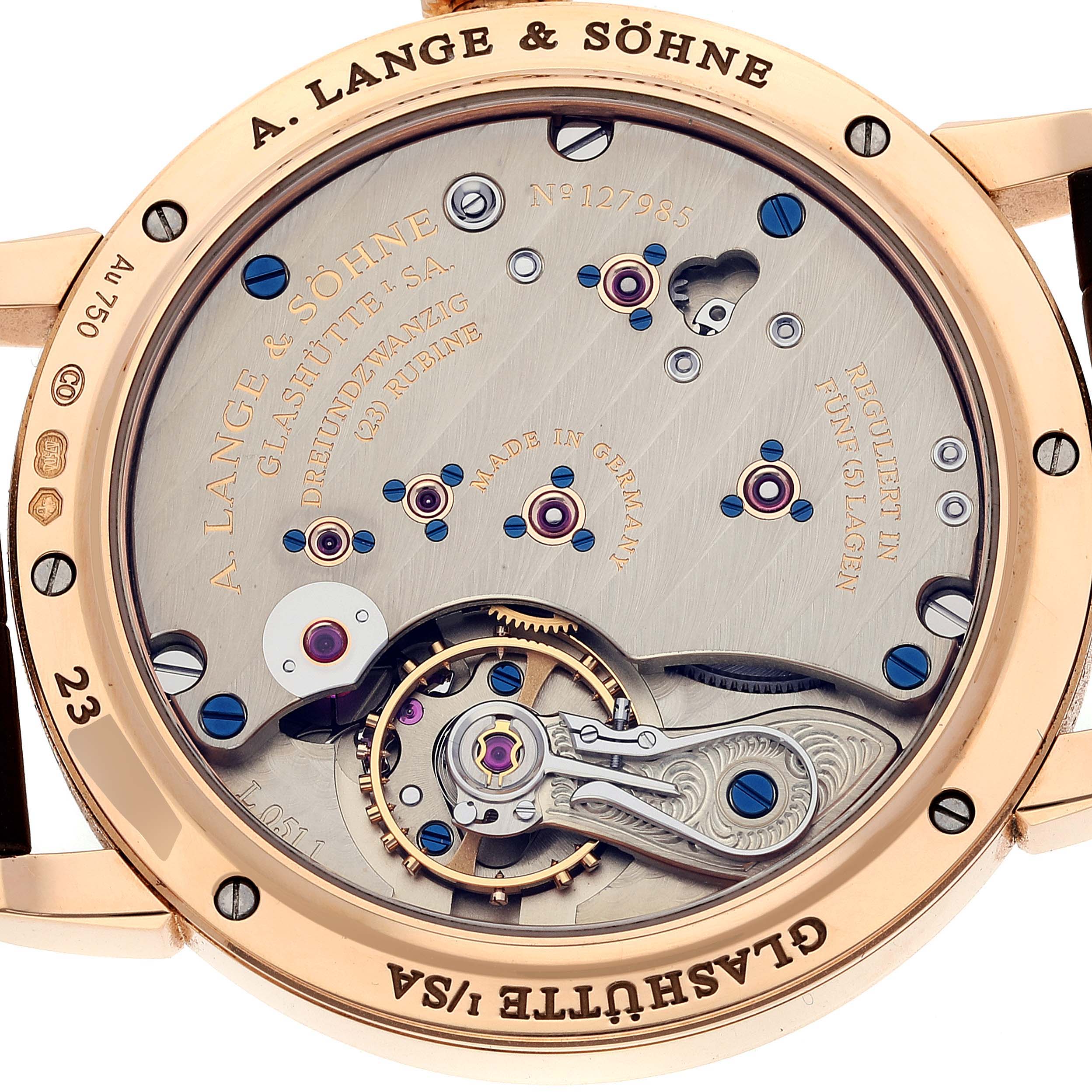 The image shows the back view of an A. Lange & Sohne 1815 235.032 Men's Rose Gold Silver Dial model, highlighting its intricate movement.