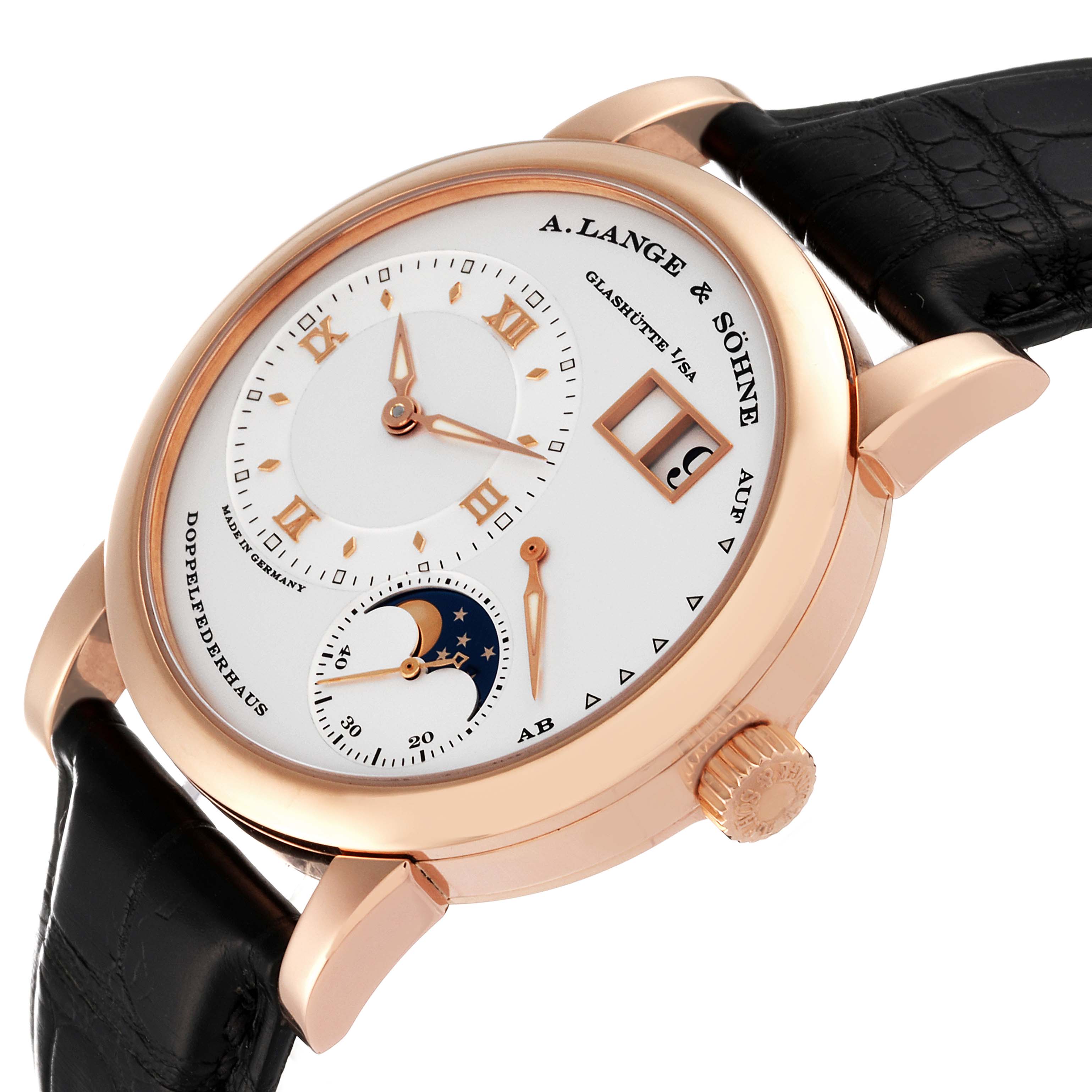 The Lange 1 by A. Lange & Söhne is shown at a slight angle, displaying the dial, hands, date window, and moonphase subdial.