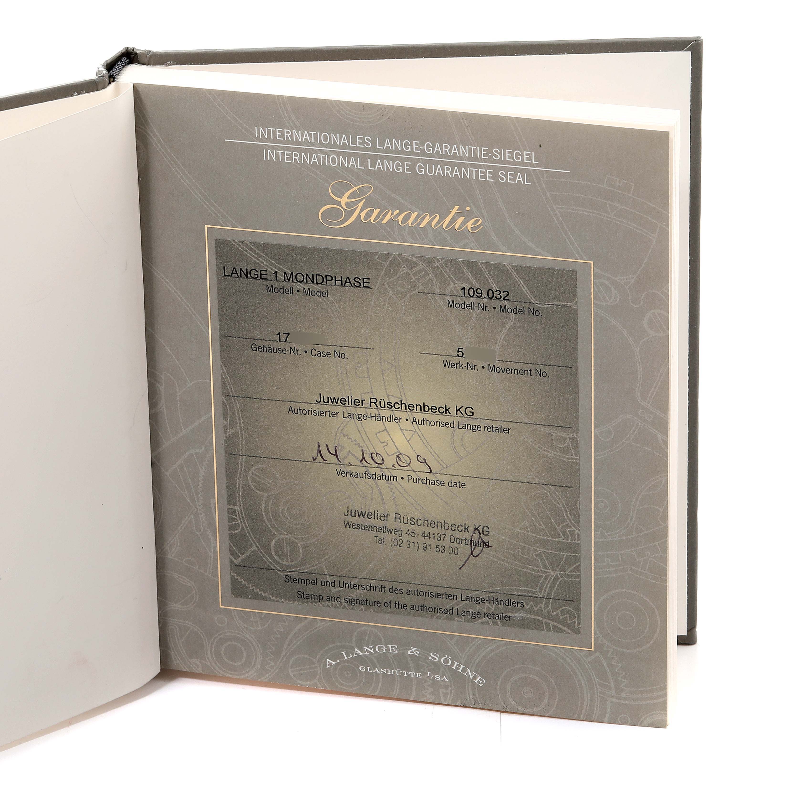 This image shows the warranty booklet for a Lange 1 model by A. Lange & Söhne.