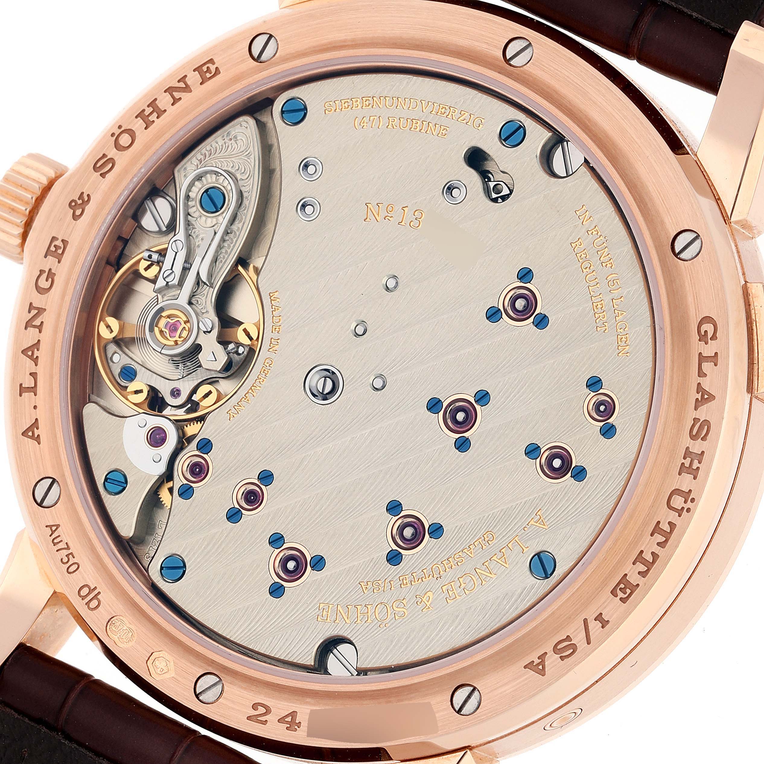 The image shows the rear view, or caseback, of an A. Lange & Sohne Lange 1 watch, highlighting its intricate movement.