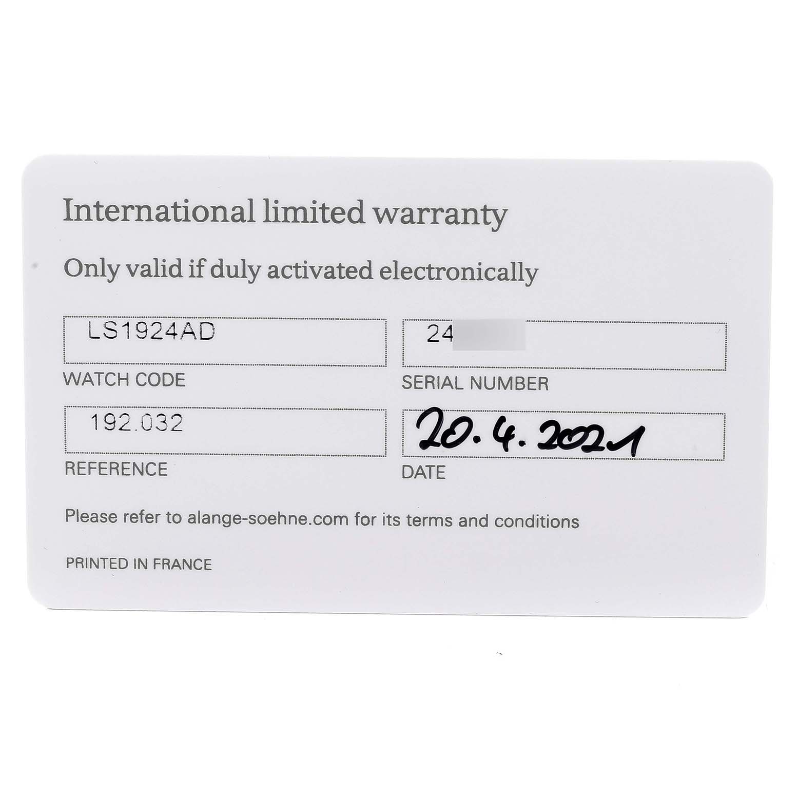 This image shows an international limited warranty card for the Lange 1 model by A. Lange & Söhne.